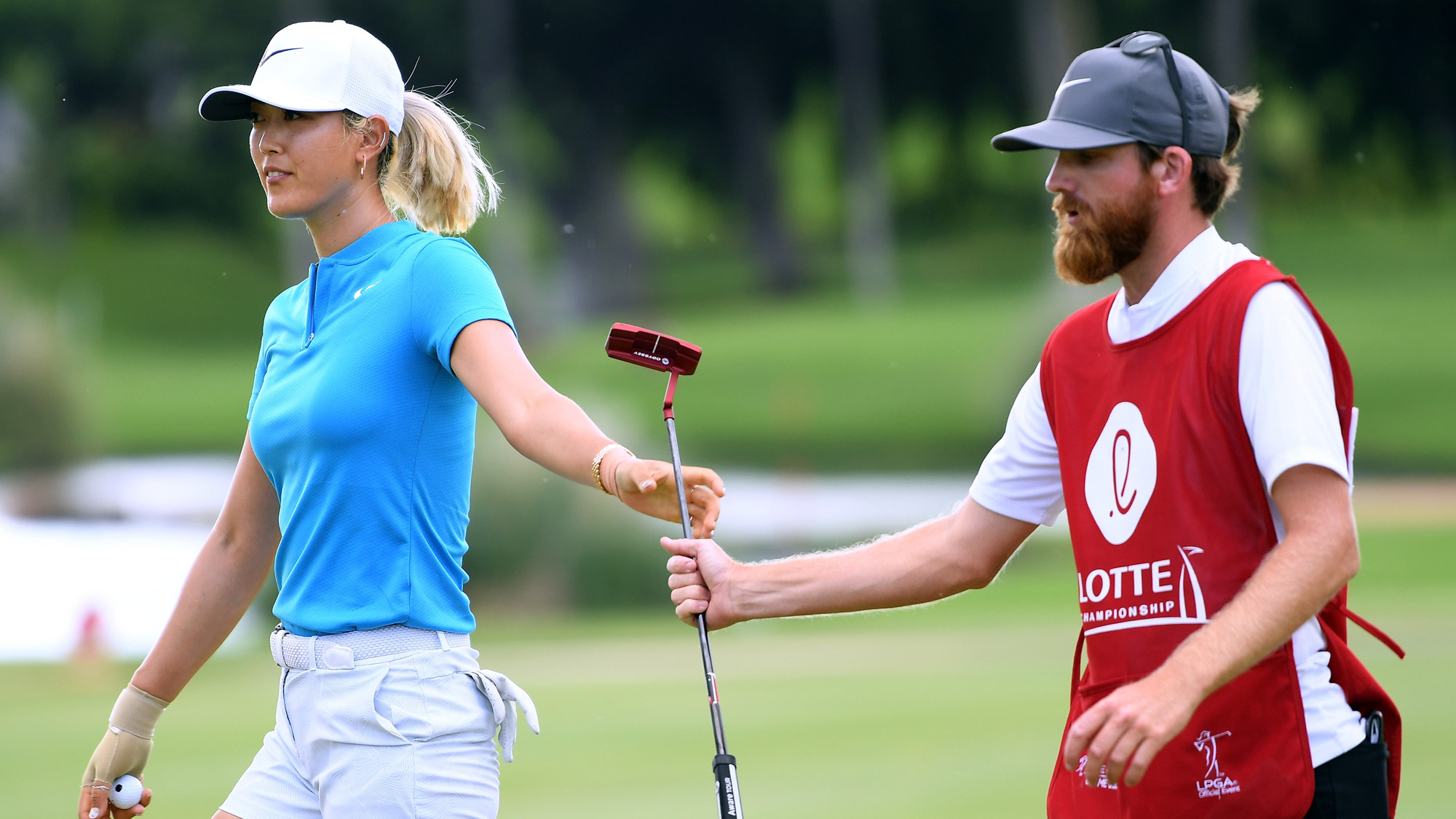 Michelle Wie Hands Her Putter Back at LOTTE