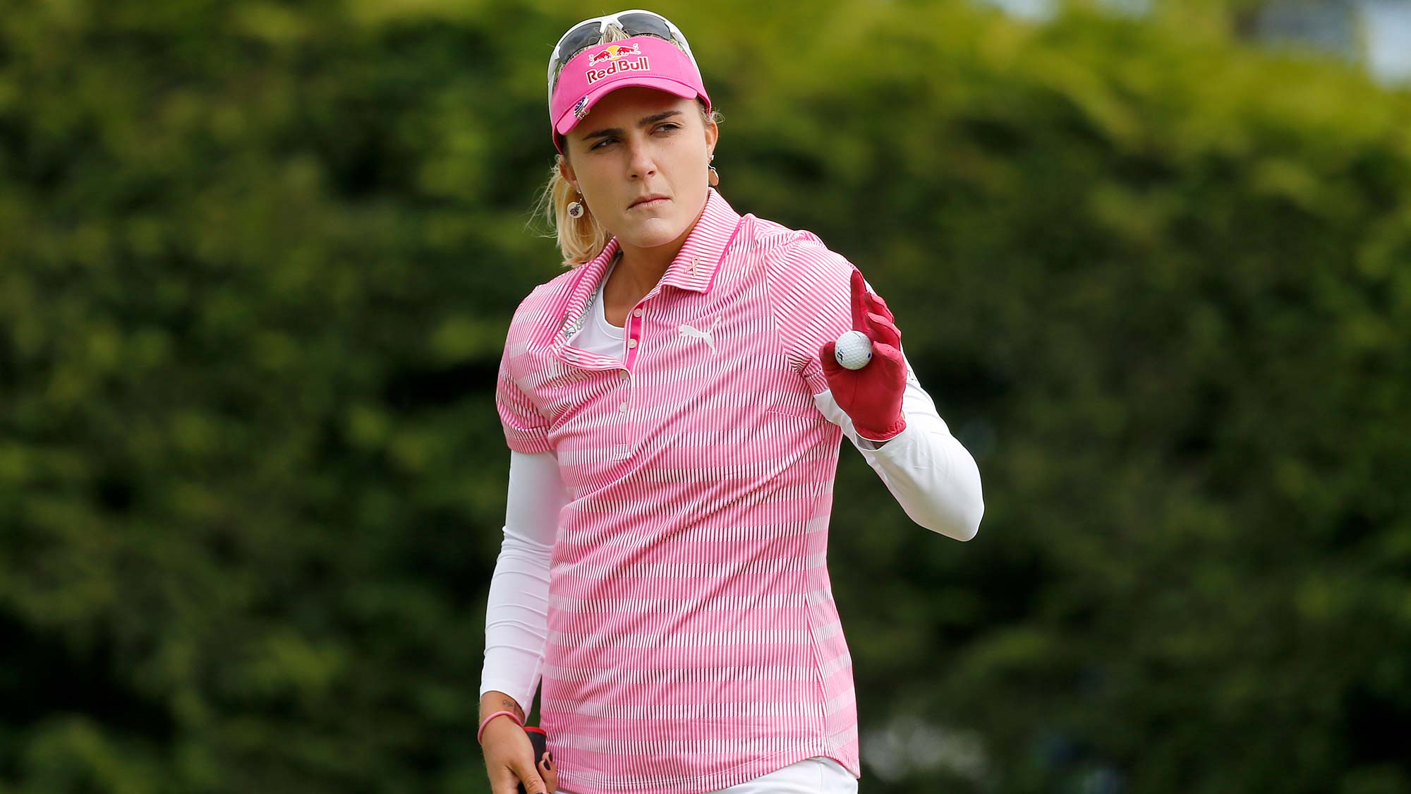 Lexi Thompson waves after making a putt on the 18th hole during the third round of the LPGA Mediheal Championship