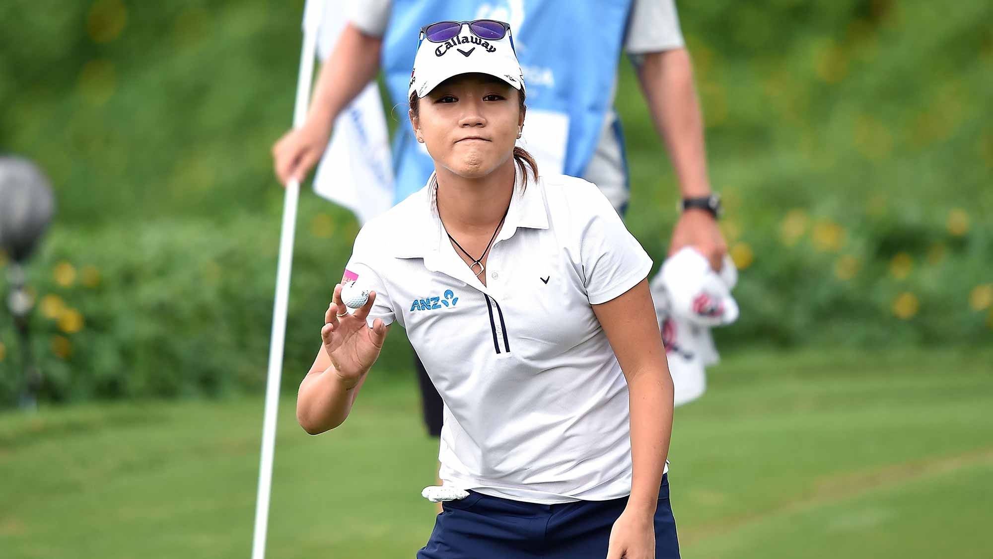 Lydia Ko of New Zealand acknowledges the fans during the second round of 2015 Fubon LPGA Taiwan Championship at Miramar Golf Country Club