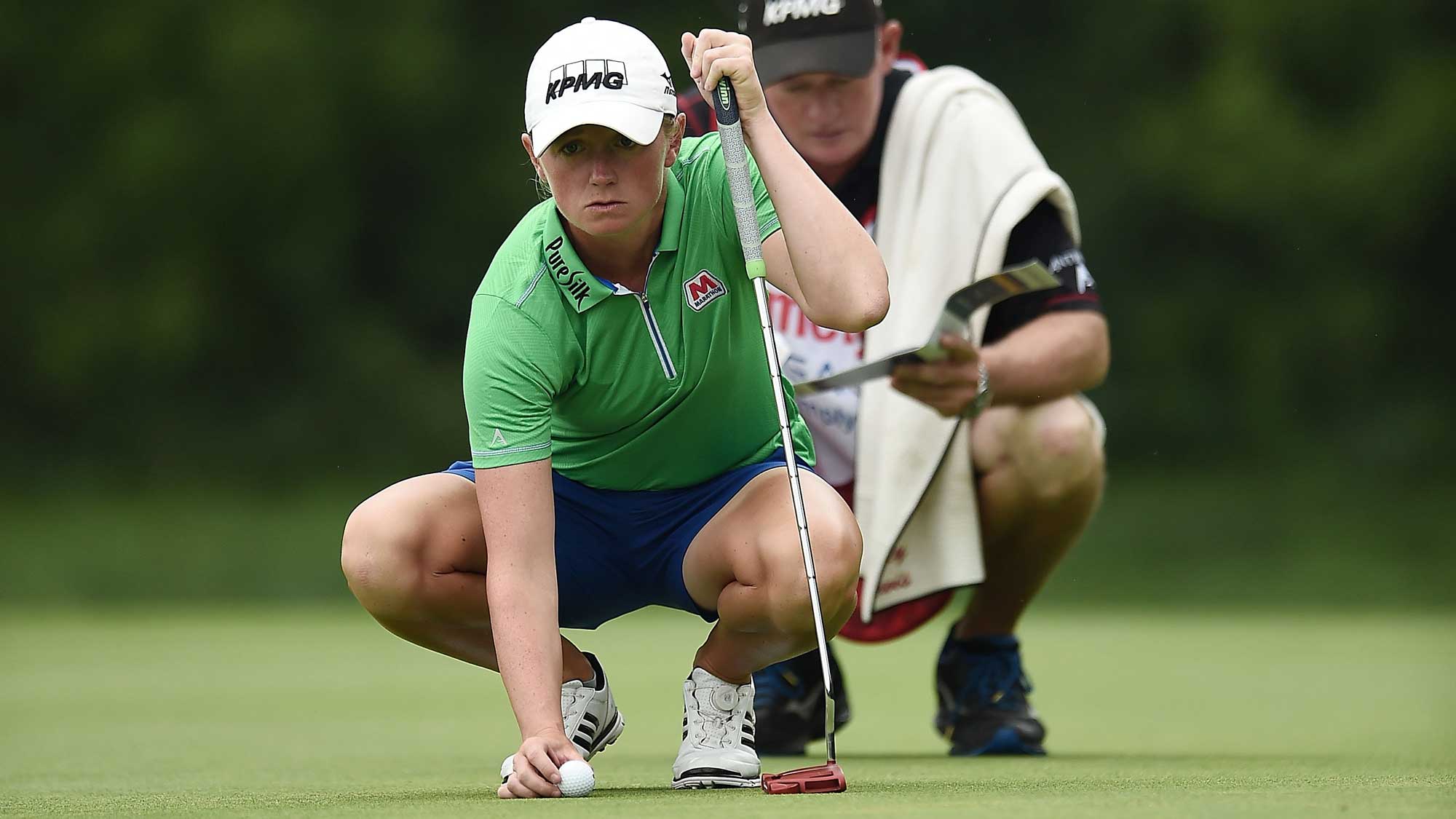 Stacy Lewis lines up a putt on the second green during the third round of the Meijer LPGA Classic