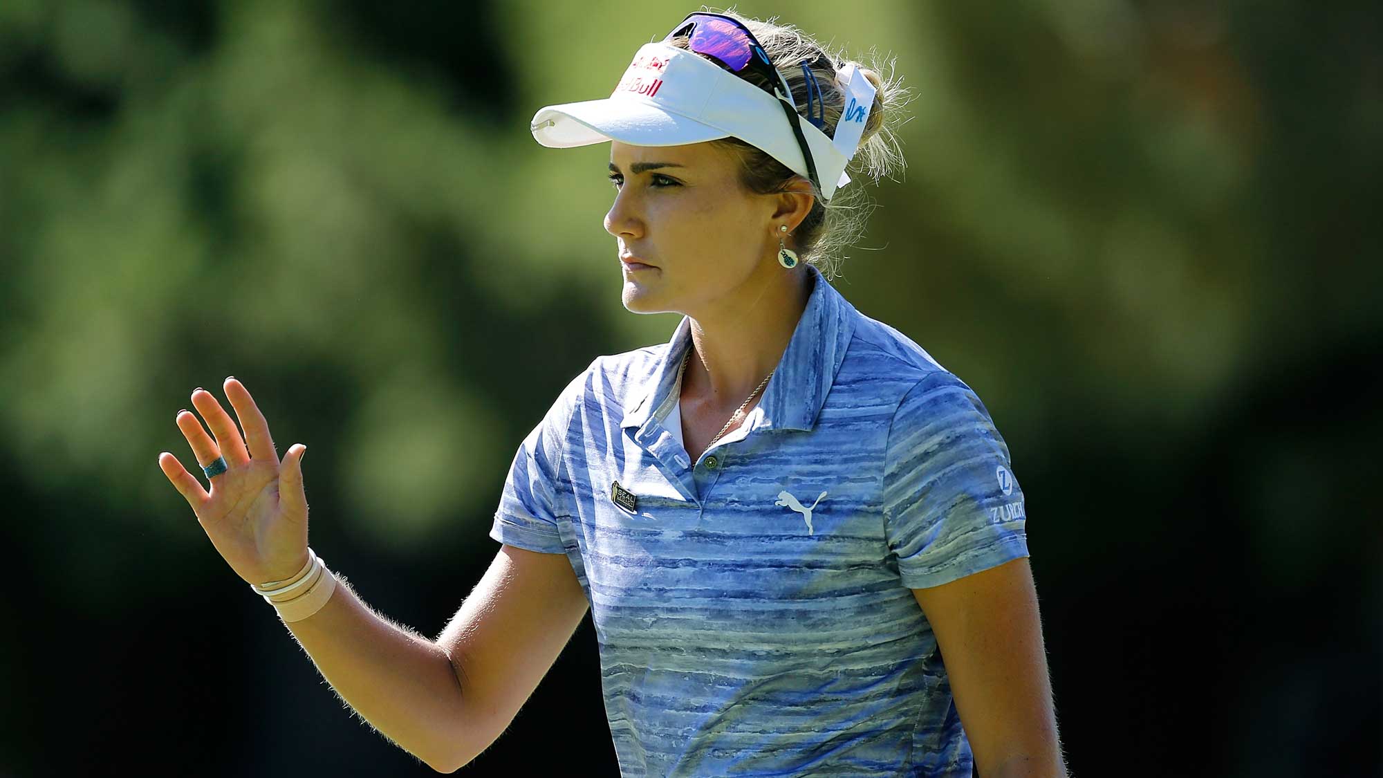 Lexi Thompson waves to the crowd on the 9th hole during the first round of the LPGA Cambia Portland Classic
