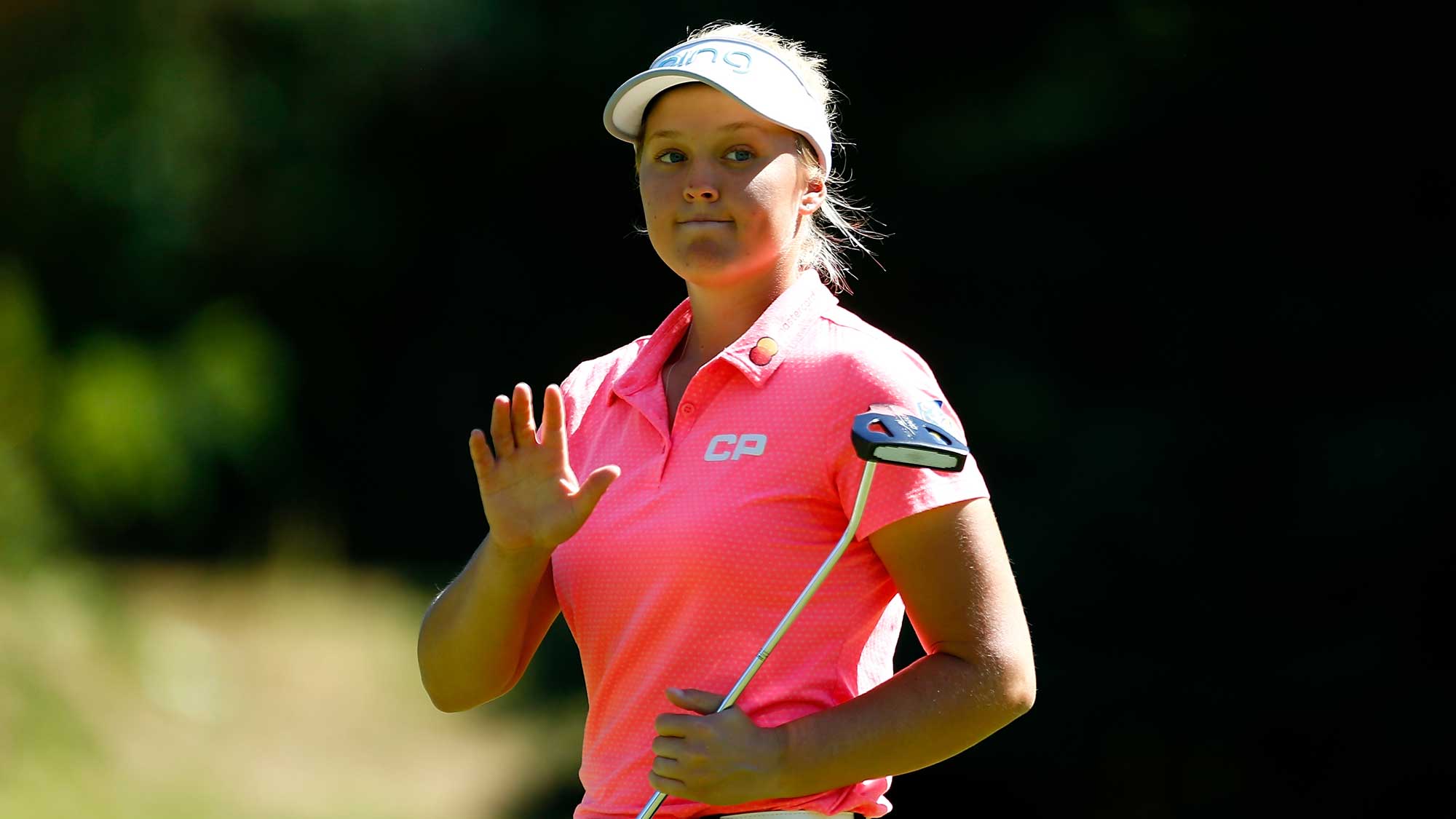 Brooke Henderson of Canada waves to the crowd after making a birdie putt on the 4th hole during the second round of the LPGA Cambia Portland Classic 
