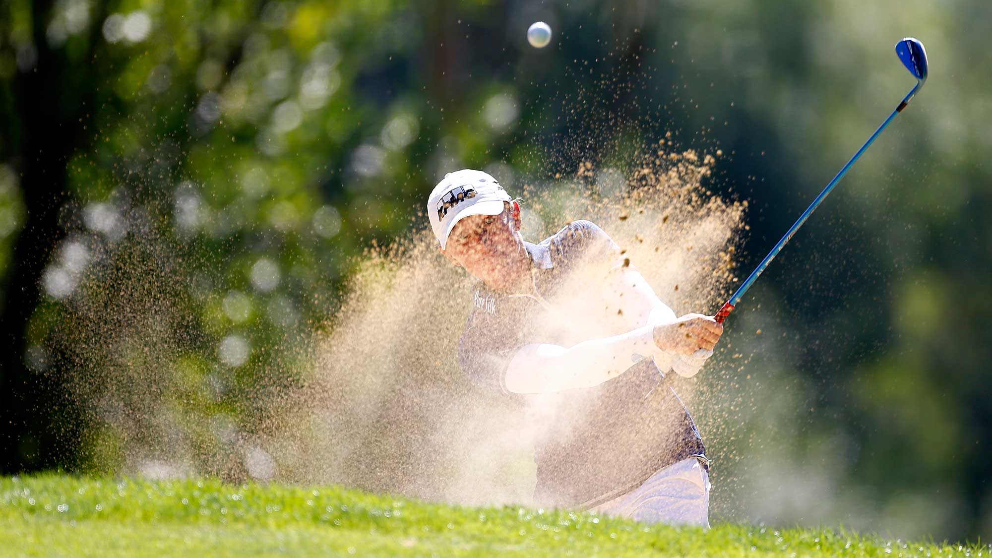 Stacy Lewis hits out of the bunker on the 5th hole during the third round of the LPGA Cambia Portland Classic