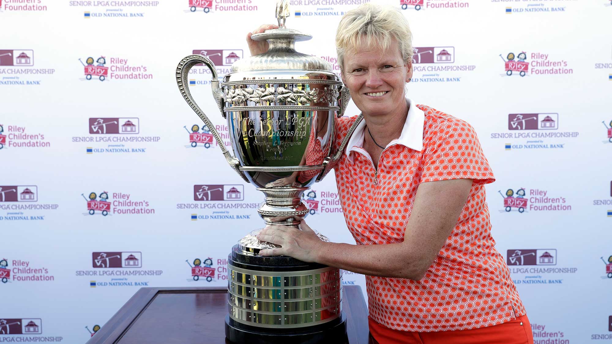 Trish Johnson of England poses with the trophy after winning the Senior LPGA Championship at the French Lick Resort