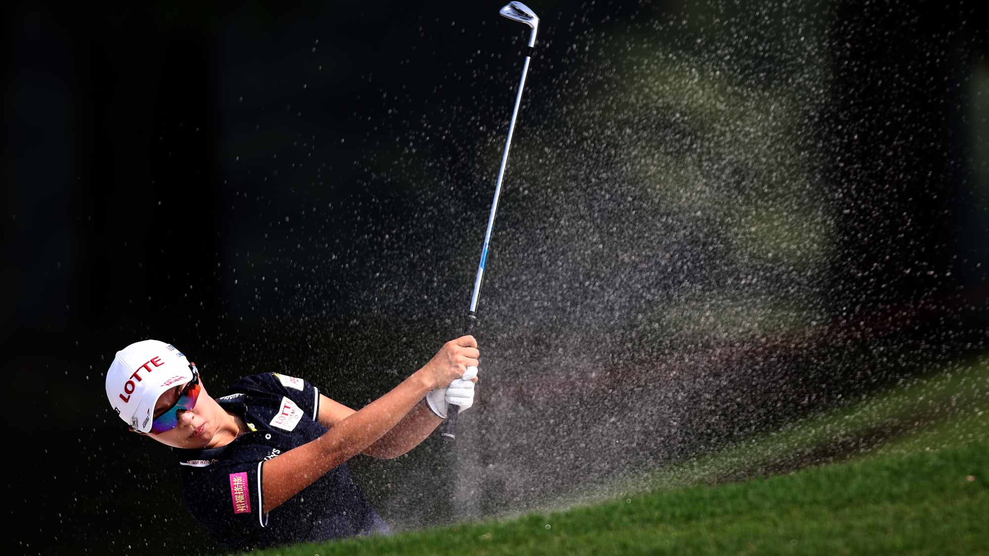 Hyo Joo Kim of South Korea plays a bunker shot on the 6th hole during round one of the Sime Darby LPGA Tour at Kuala Lumpur Golf & Country Club