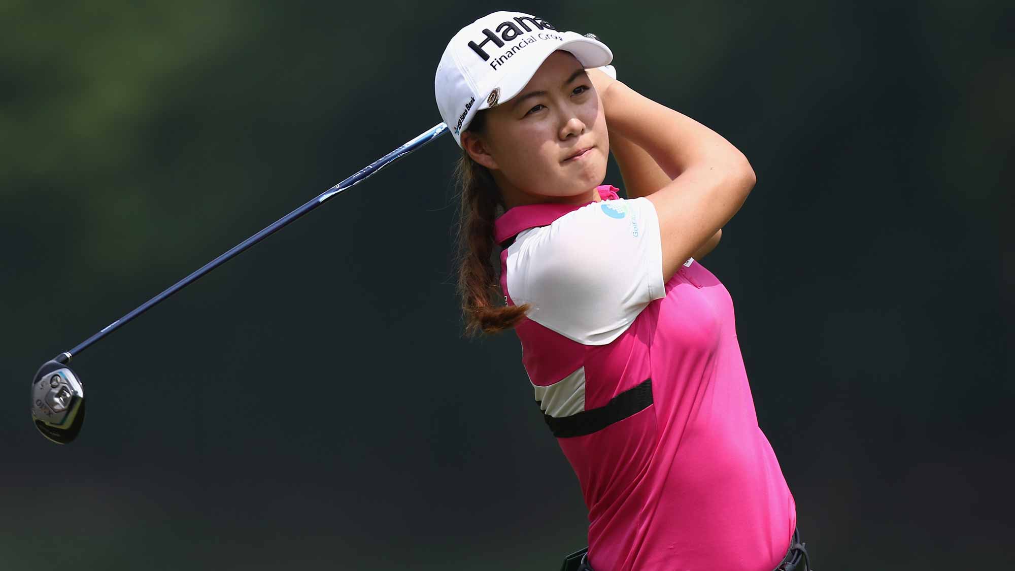 Minjee Lee of Australia watches her 2nd shot on the 6th hole during round one of the Sime Darby LPGA Tour at Kuala Lumpur Golf & Country Club