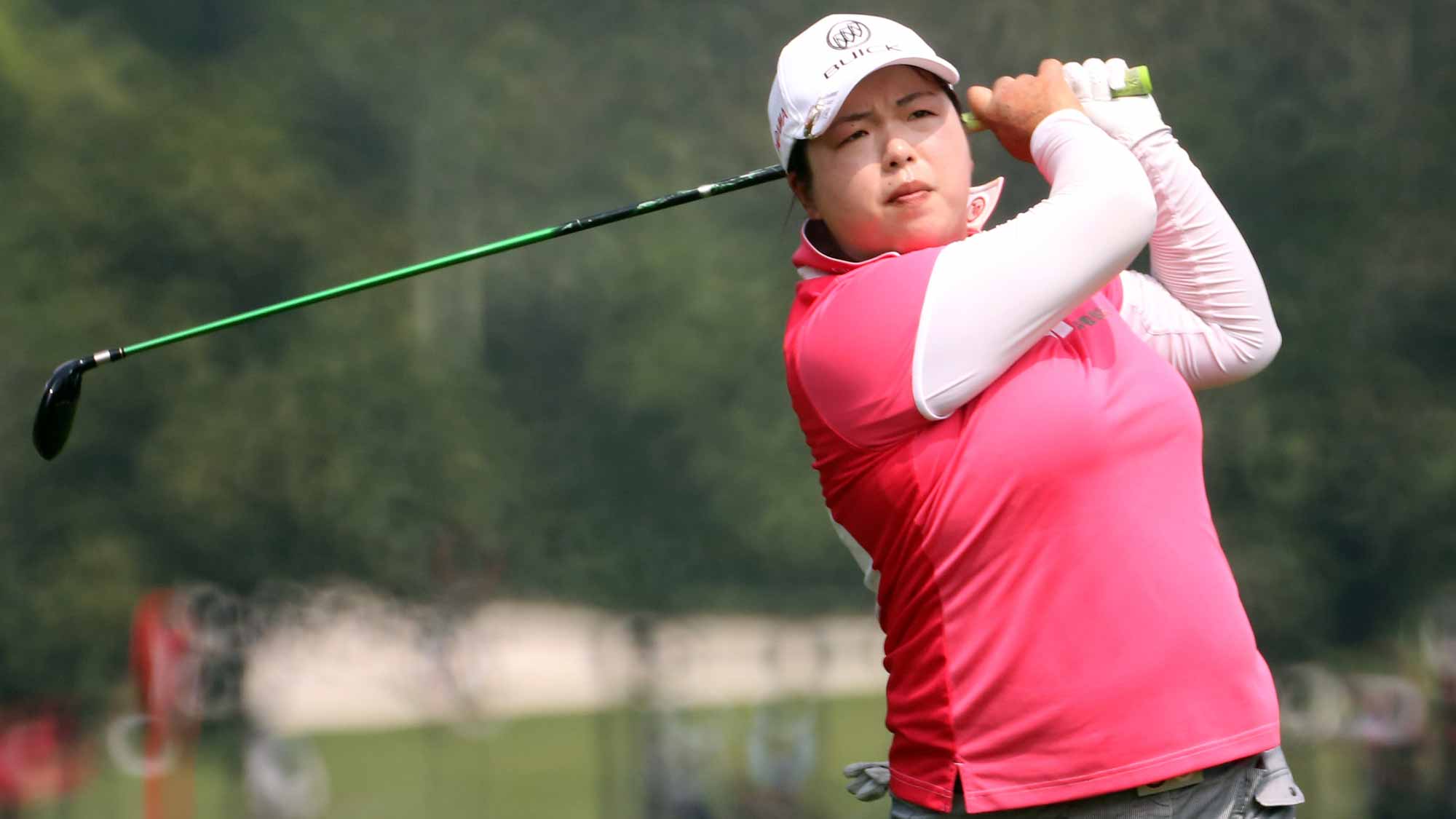 Shanshan Feng of China watches her 2nd shot on the 6th hole during round one of the Sime Darby LPGA Tour at Kuala Lumpur Golf & Country Club
