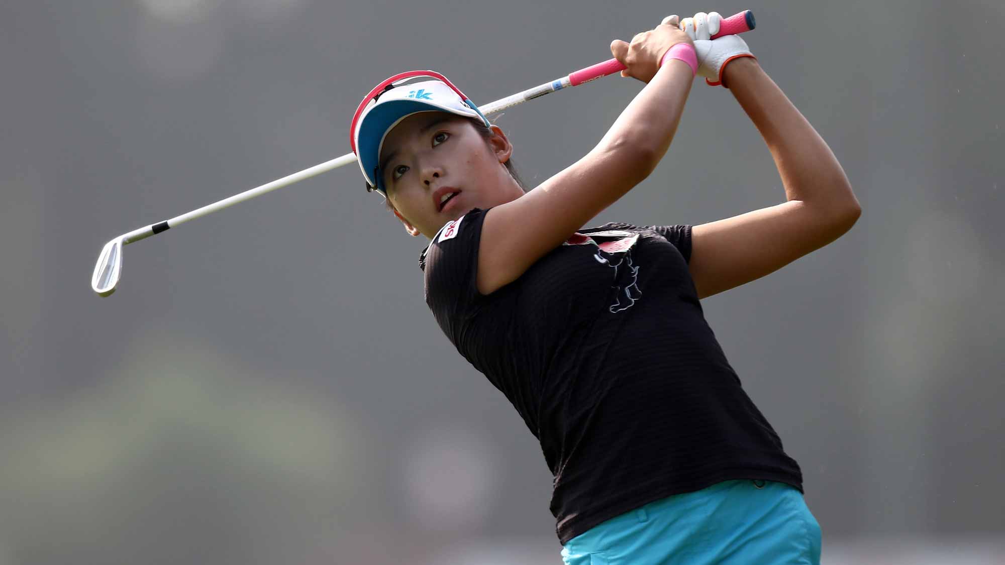 Mi Hyang Lee of South Korea plays her 2nd shot on the 10th hole during round two of the Sime Darby LPGA Tour at Kuala Lumpur Golf & Country Club