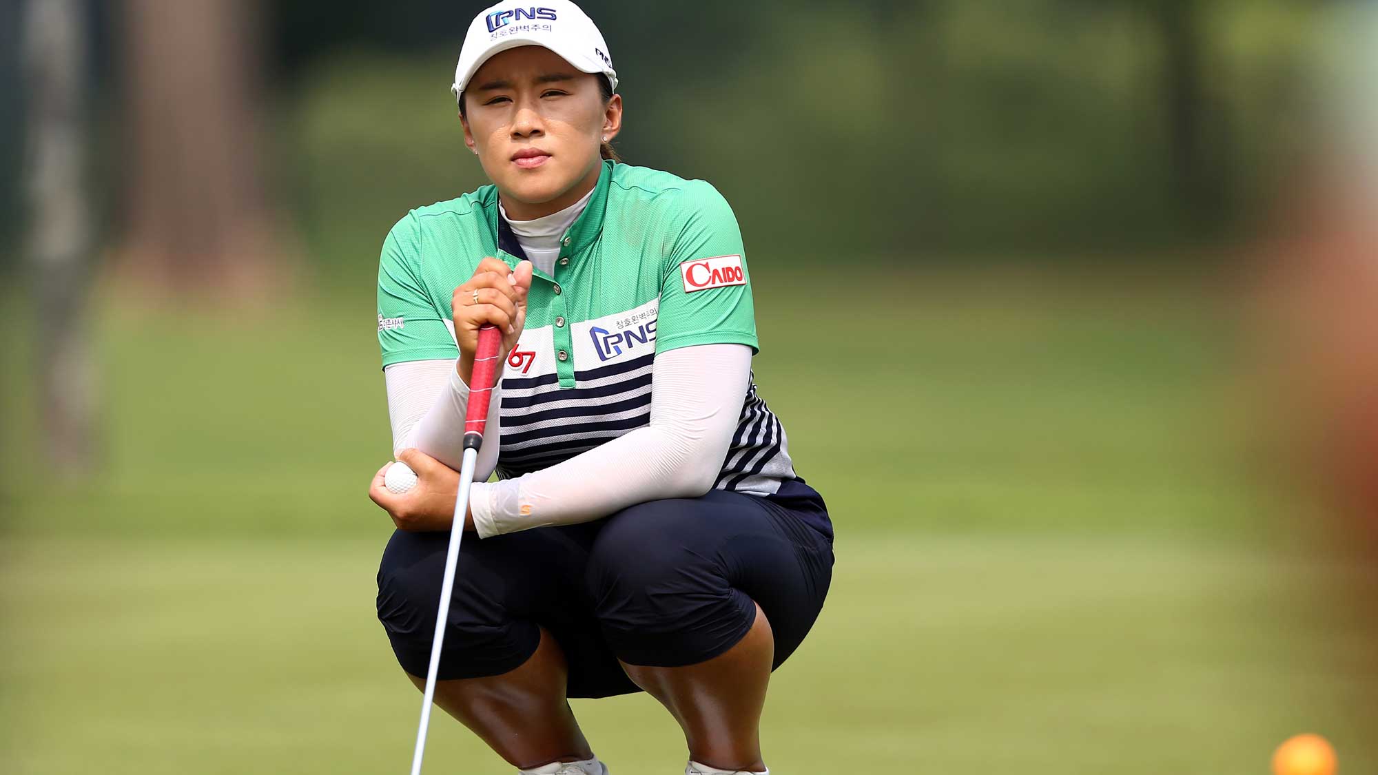 Amy Yang of South Korea waits for her turn to putt on the 3rd hole during round three of the Sime Darby LPGA Tour at Kuala Lumpur Golf & Country Club