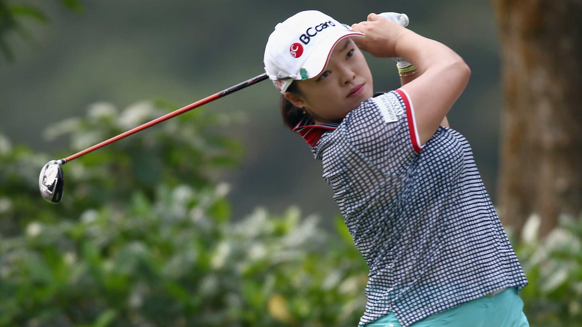 Ha Na Jang of South Korea watches her tee shot on the 4th hole during round three of the Sime Darby LPGA Tour at Kuala Lumpur Golf & Country Club 