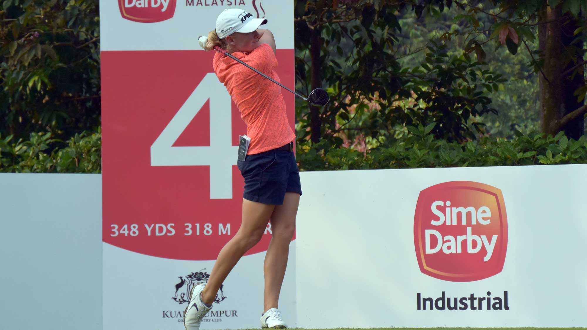 Stacy Lewis of USA watches her tee shot on the 4th hole during round three of the Sime Darby LPGA Tour at Kuala Lumpur Golf & Country Club