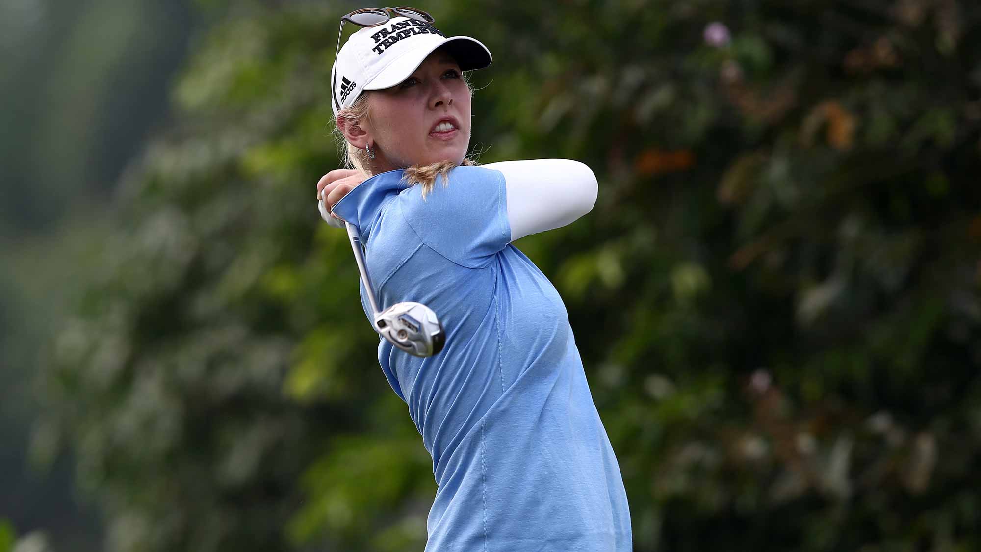 Jessica Korda of USA watches her tee shot on the 4th hole during the final round of the Sime Darby LPGA Tour at Kuala Lumpur Golf & Country Club