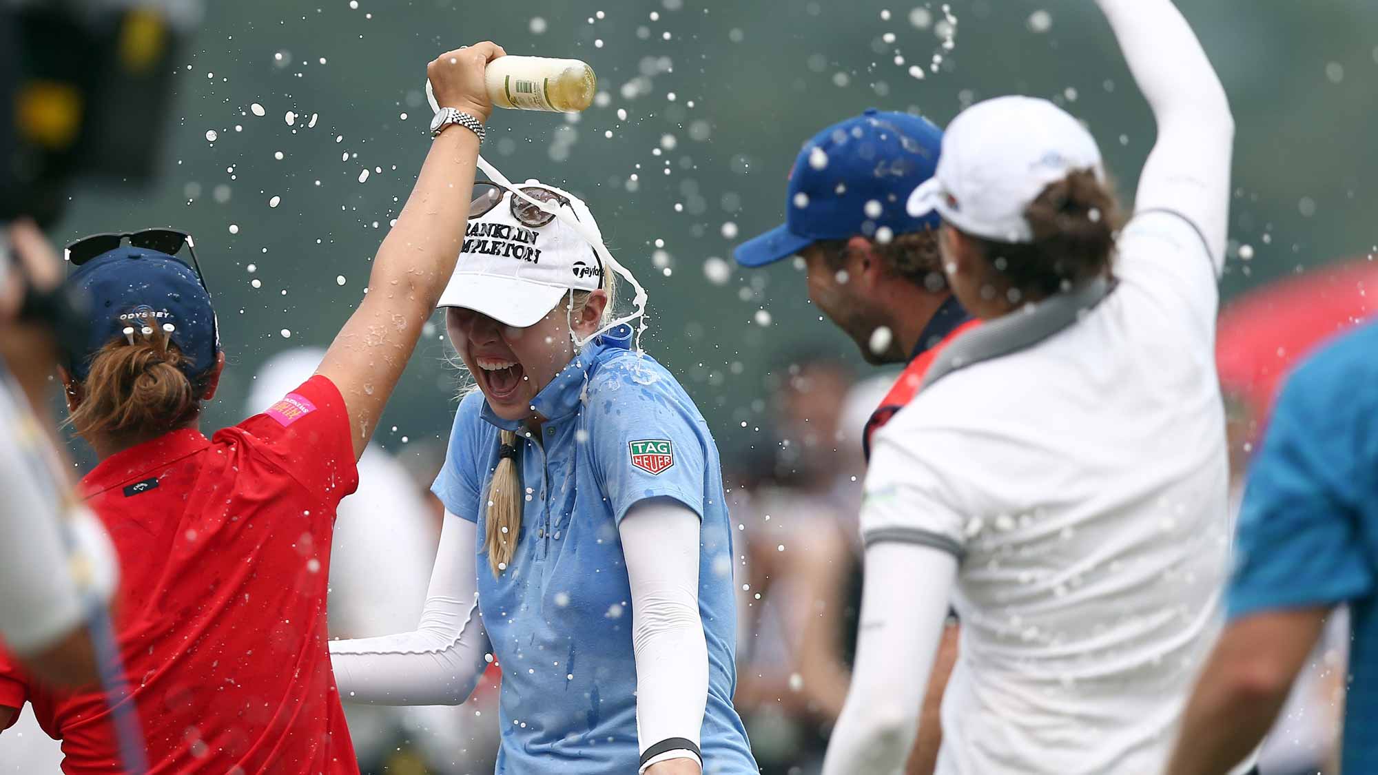 Jessica Korda of USA is splashed with water on the 18th hole after winning the Sime Darby LPGA in the final round of the Sime Darby LPGA Tour at Kuala Lumpur Golf & Country Club