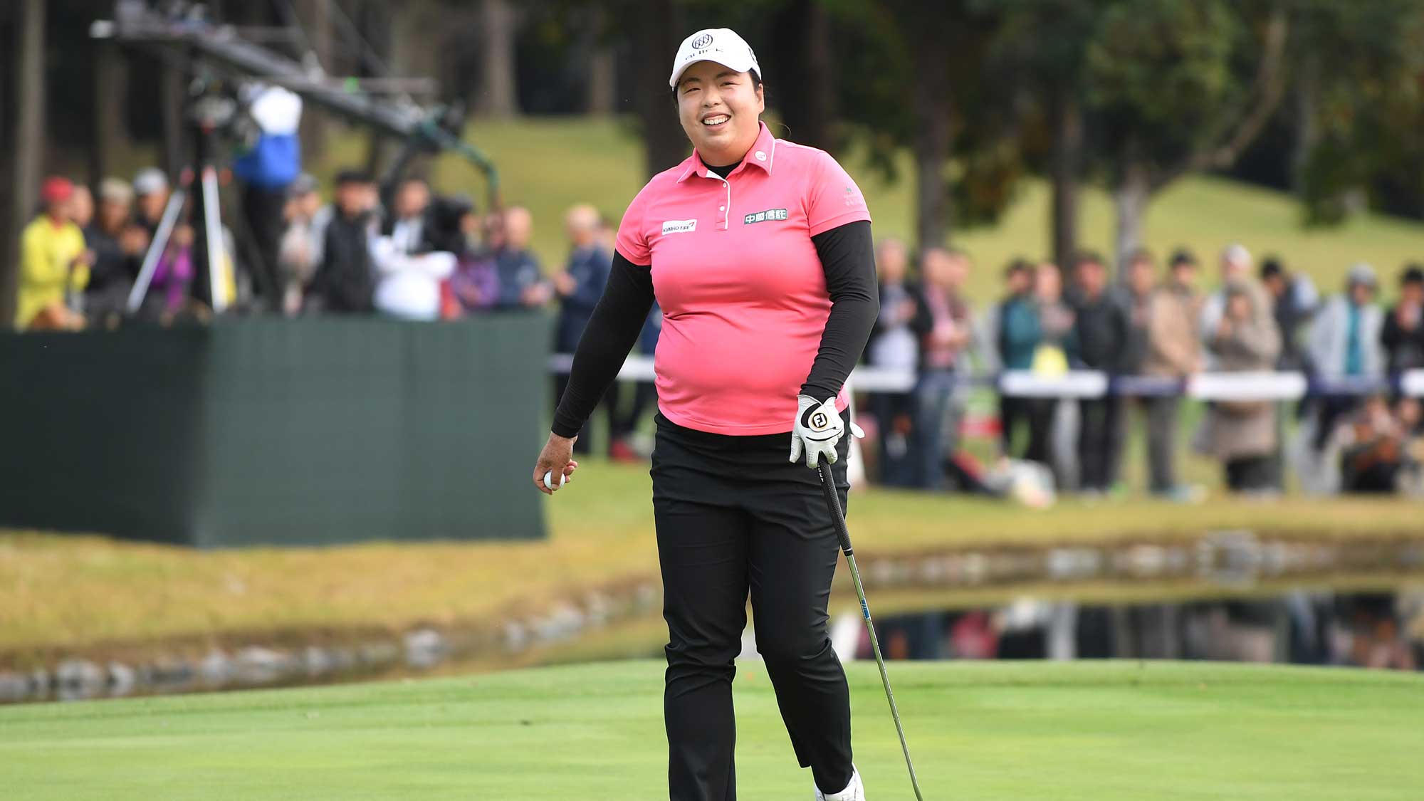 Shanshan Feng of China celebrates after winning the TOTO Japan Classic