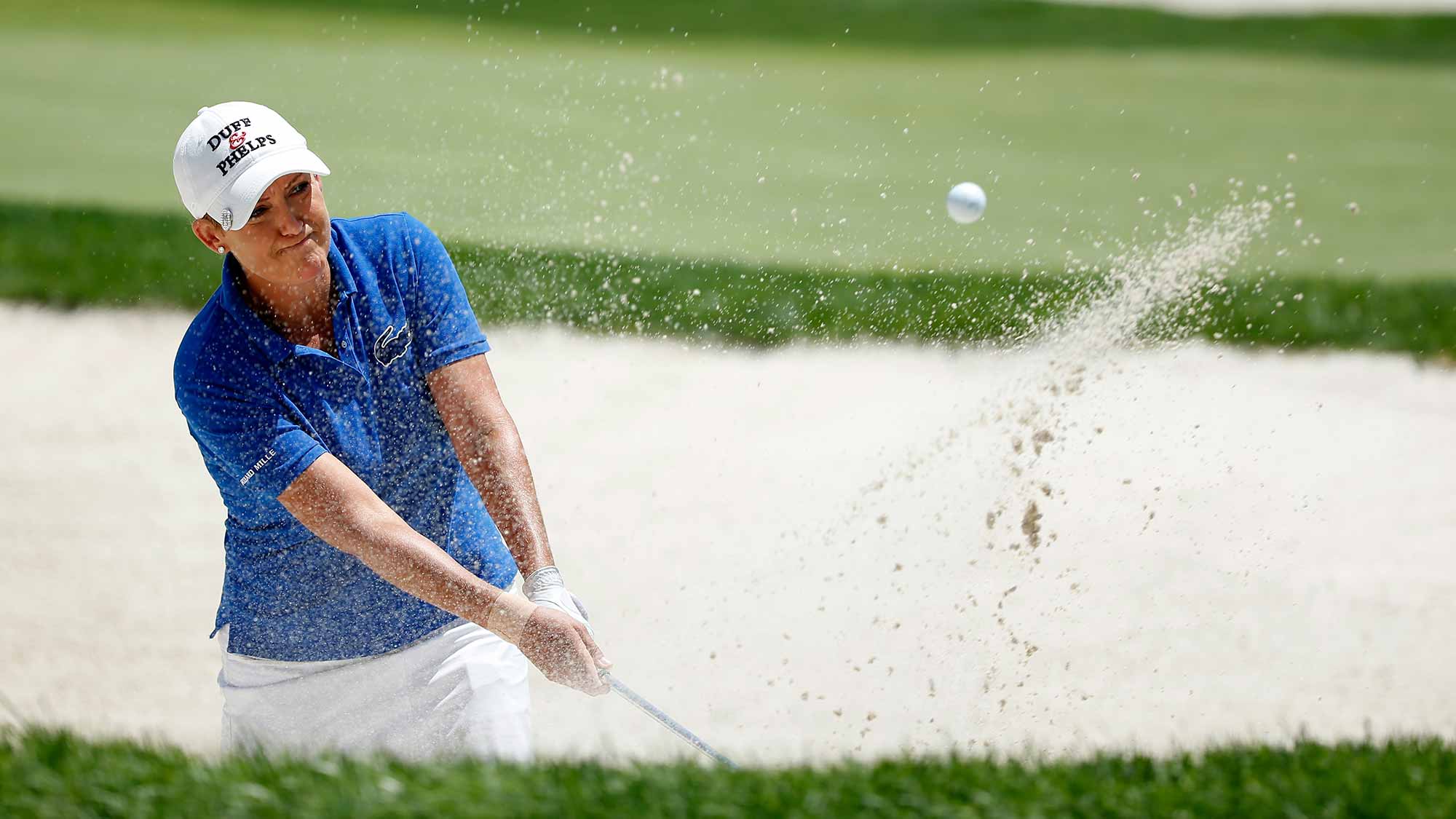 Cristie Kerr of the United States hits a bunker shot on the 16th hole during the second round of the U.S. Women's Open at Lancaster Country Club