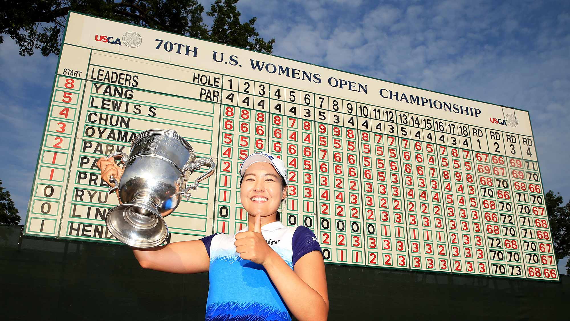 In Gee Chun of South Korea poses with the trophy after winning the U.S. Women's Open at Lancaster Country Club