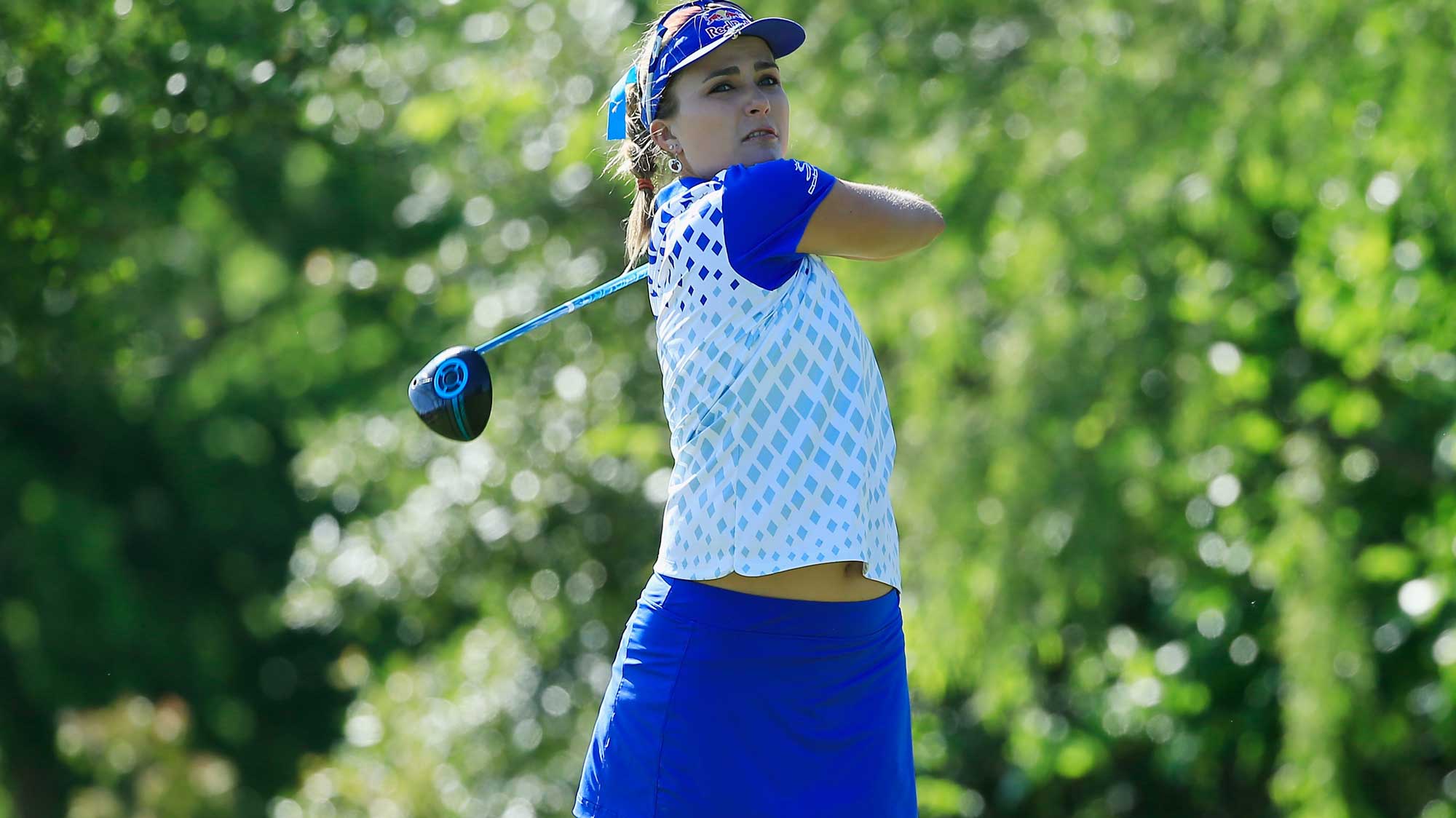 Lexi Thompson watches her tee shot on the seventh hole during the first round of the Volunteers of America Texas Shootout