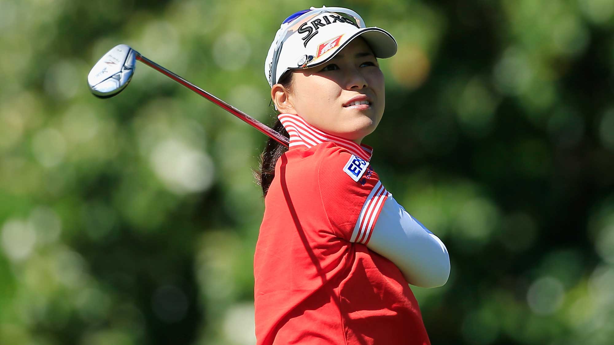 Sakura Yokomine of Japan watches her tee shot on the sixth hole during the first round of the Volunteers of America Texas Shootout