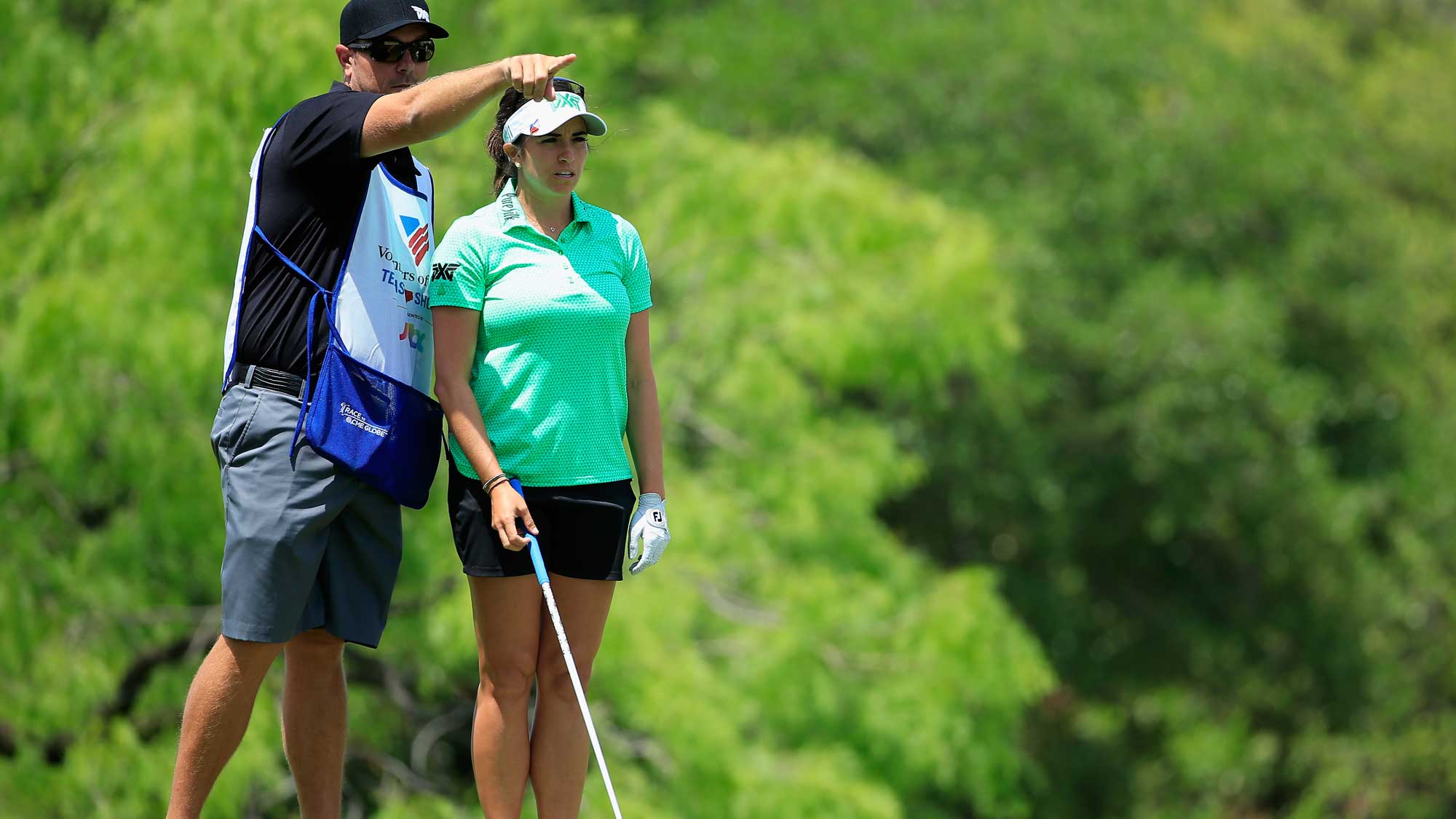 Gerina Piller lines up her tee shot on the third hole with her caddie Brian Dilley during the third round of the Volunteers of America Texas Shootout