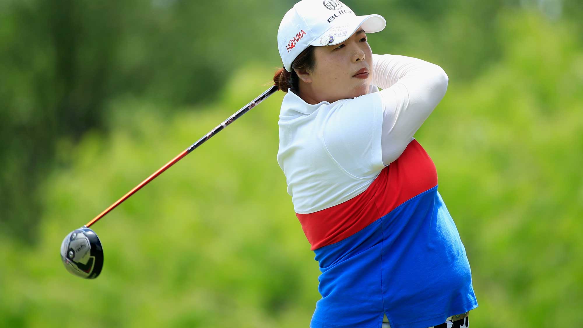 Shanshan Feng of China hits her tee shot on the eighth hole during the third round of the Volunteers of America Texas Shootout