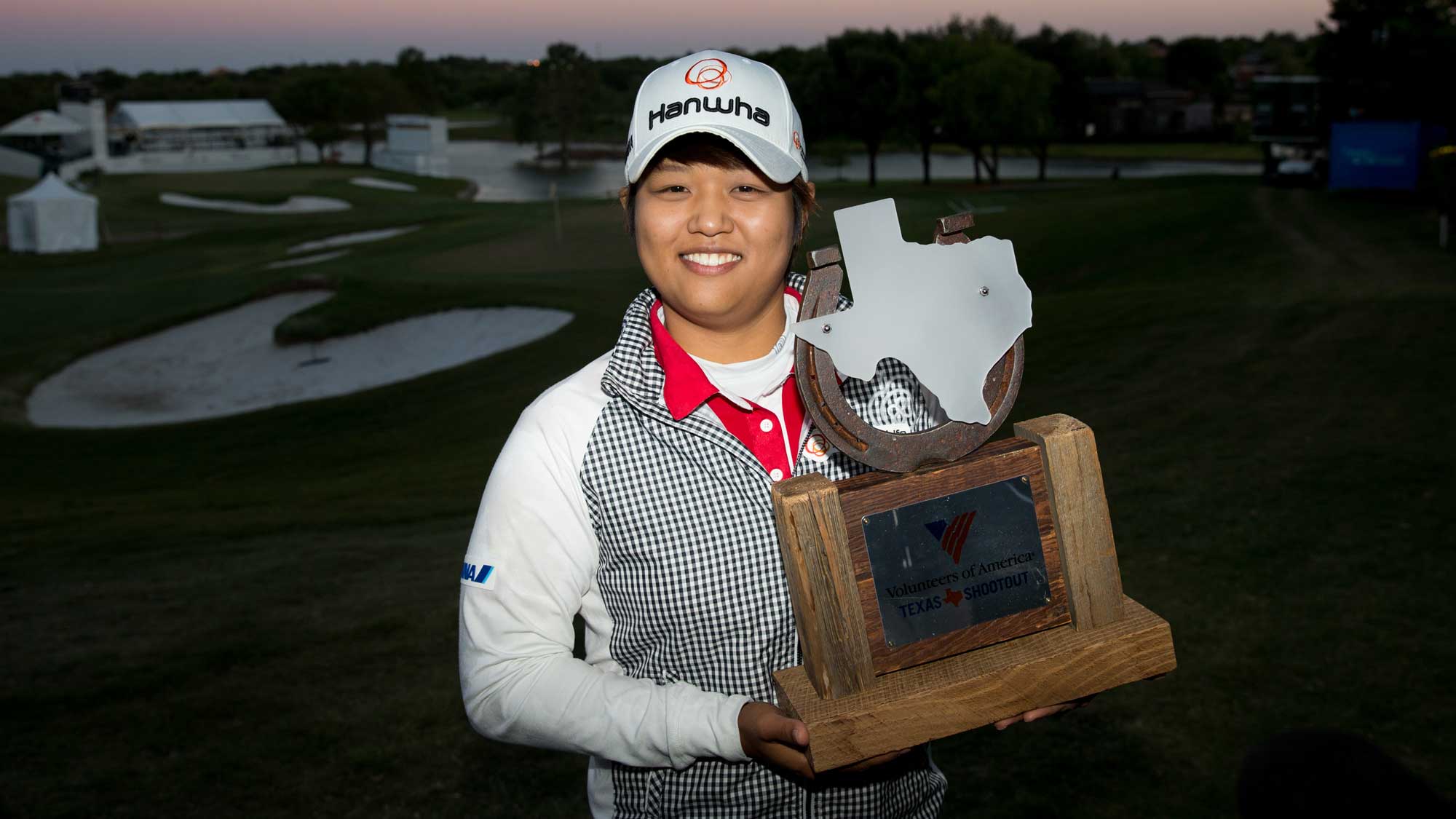 Haru Nomura of Japan poses with the champion's trophy following her playoff victory over Cristie Kerr in the final round of the Volunteers of America Texas Shootout