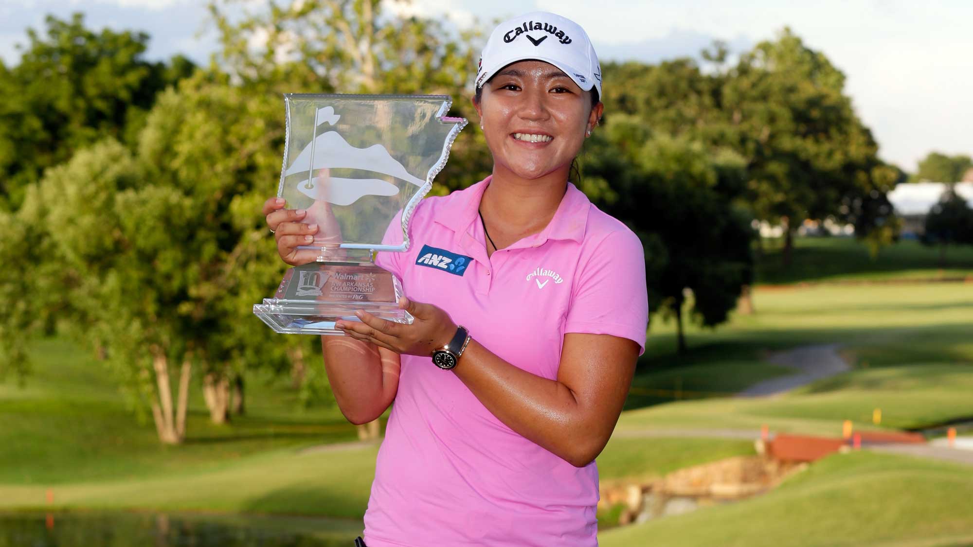 Lydia Ko of New Zealand displays the trophy after winning the Walmart NW Arkansas Championship 