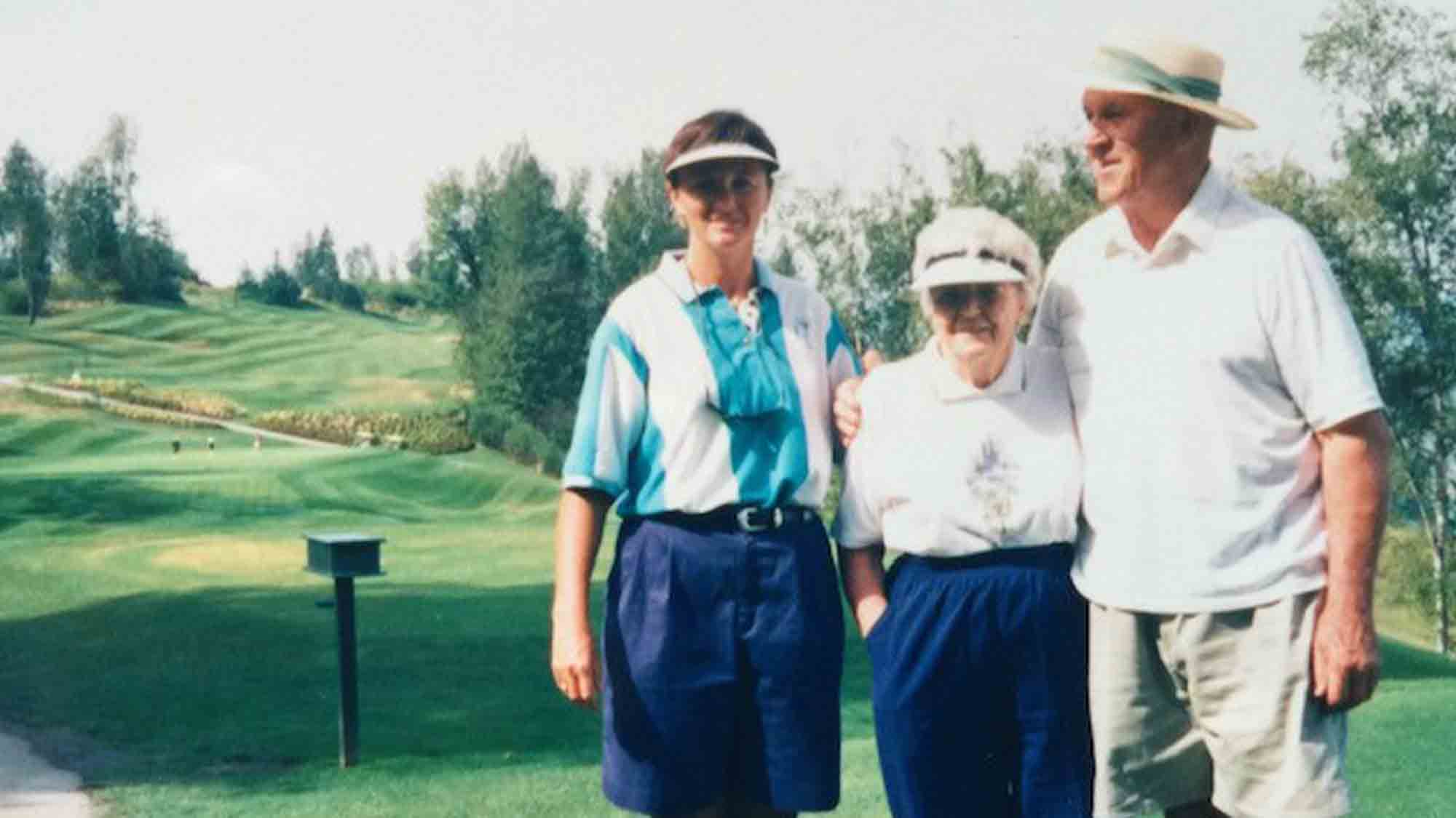 Kathy learning golf with her parents - they started playing when they retired and loved the game!