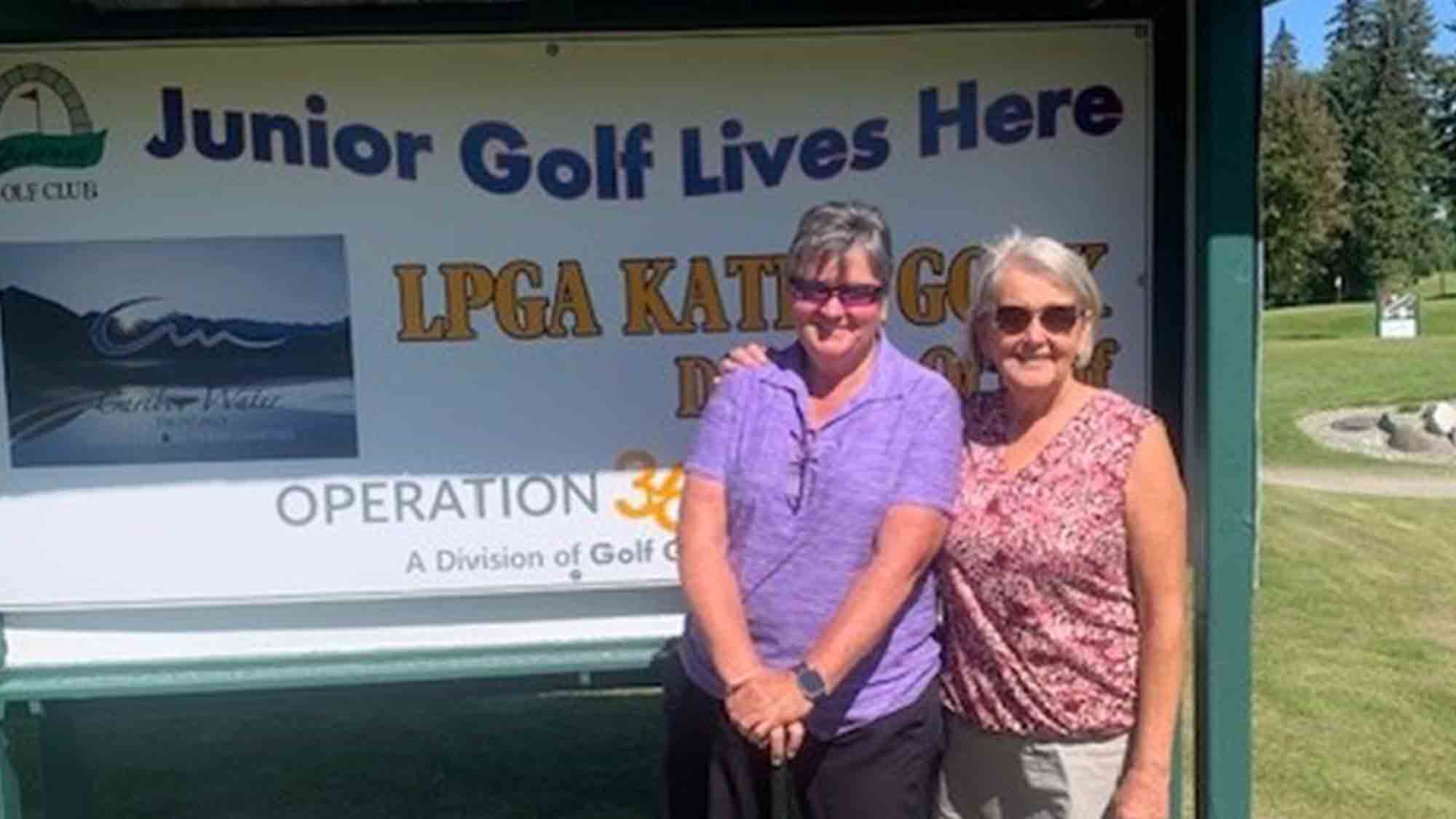 Kathy Gook with Kit Collins, owner of the golf course where she works.