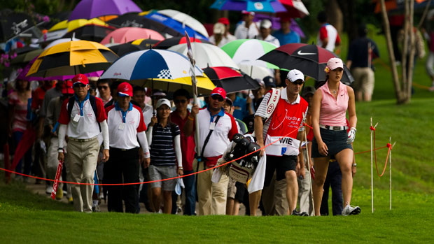 Spectators follow Michelle Wie round three Honda PTT LPGA Thailand 2010