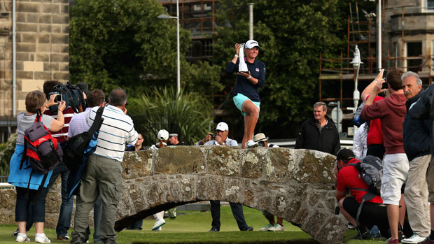 Stacy Lewis poses with the trophy on the Swilcan Bridge 