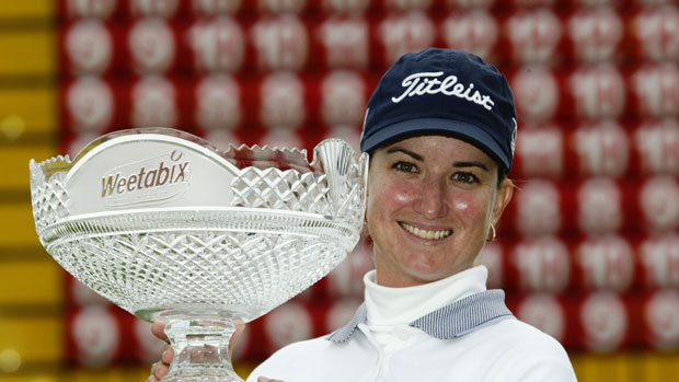 Karrie Webb with winner's trophy 2002.