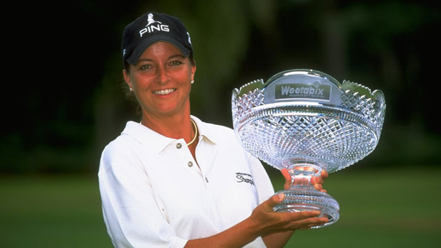 Sherri Steinhauer with winner's trophy 1999