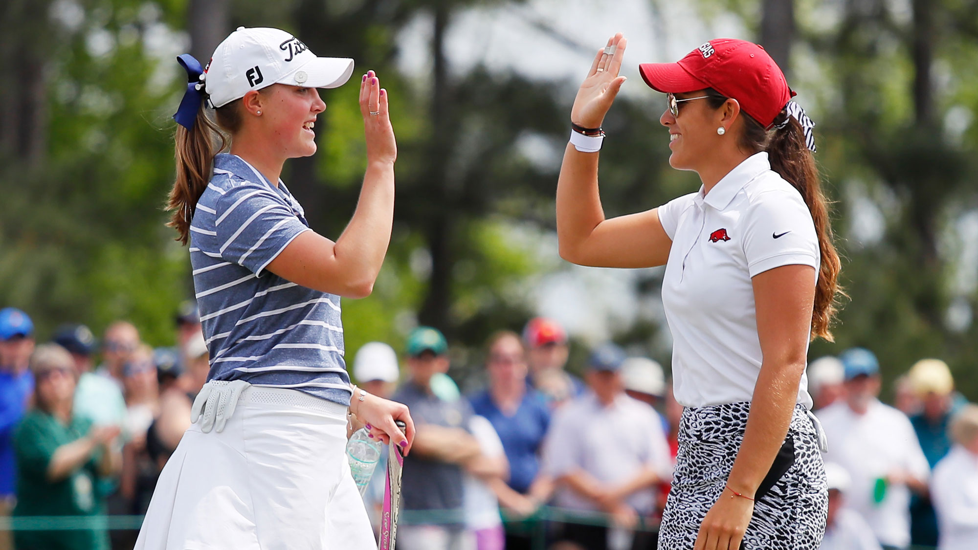 Maria Fassi (R) of Mexico and Jennifer Kupcho of the United States react on the 18th green during the final round of the Augusta National Women's Amateur 