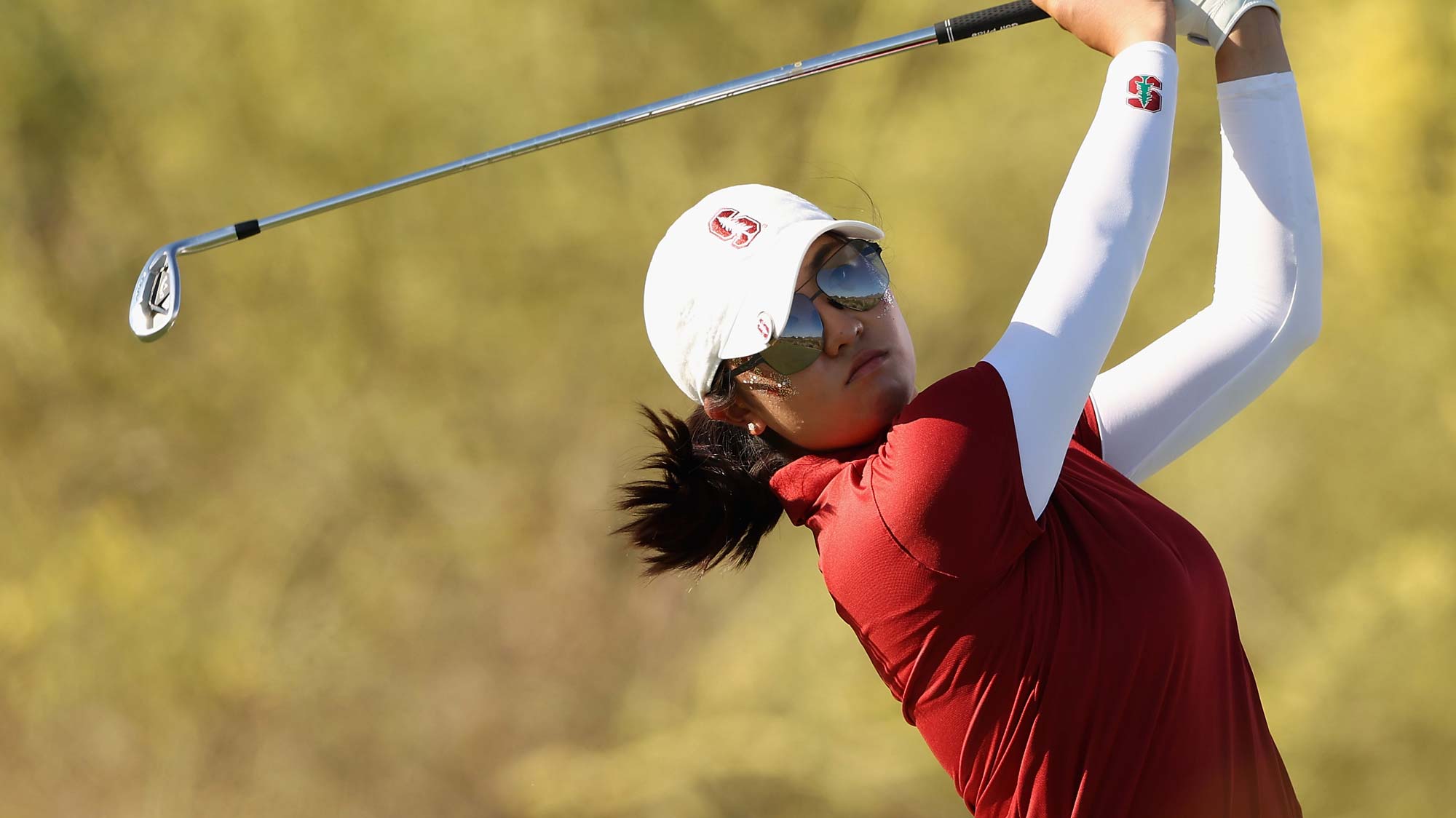Rose Zhang of the Stanford Cardinal plays a tee shot on the 16th hole during the NCAA women’s Golf Championships at Grayhawk Golf Club