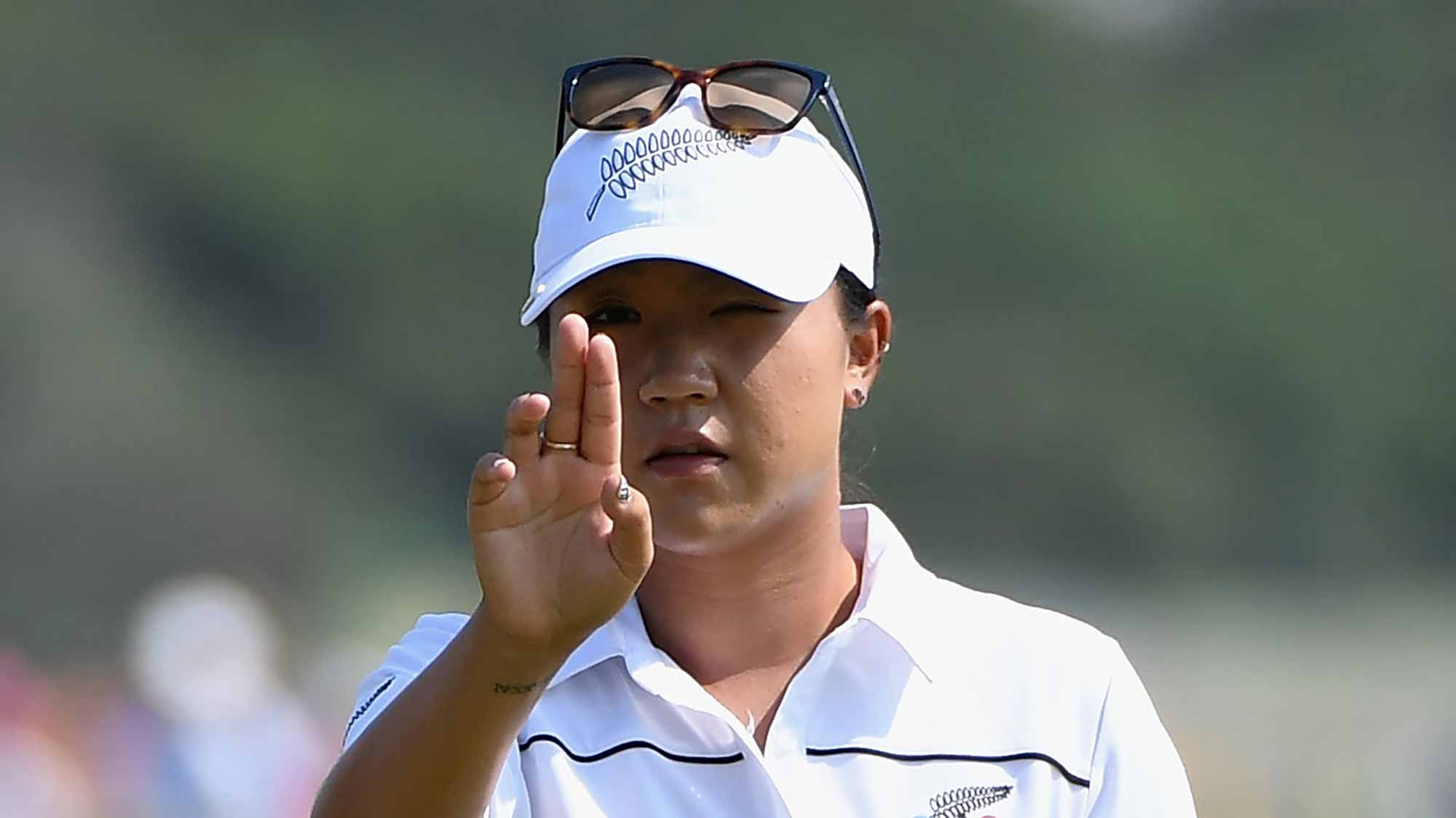 Lydia Ko of New Zealand on the 4th green during the third round of the Women's Individual Stroke Play golf on day 14 of the Rio Olympics at the Olympic Golf Course