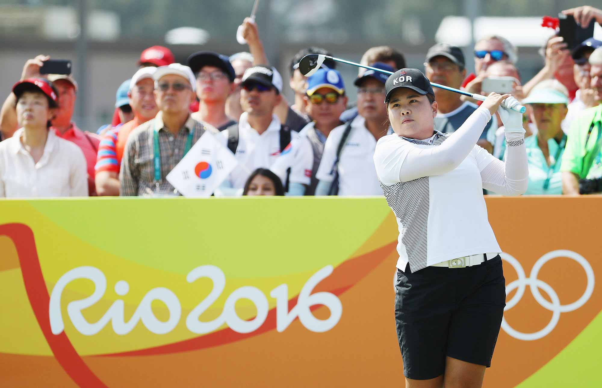 Inbee Park of Korea watches her tee shot on the first hole during the third round of the Women's Individual Stroke Play golf on Day 14 of the Rio 2016 Olympic Games at Olympic Golf Course