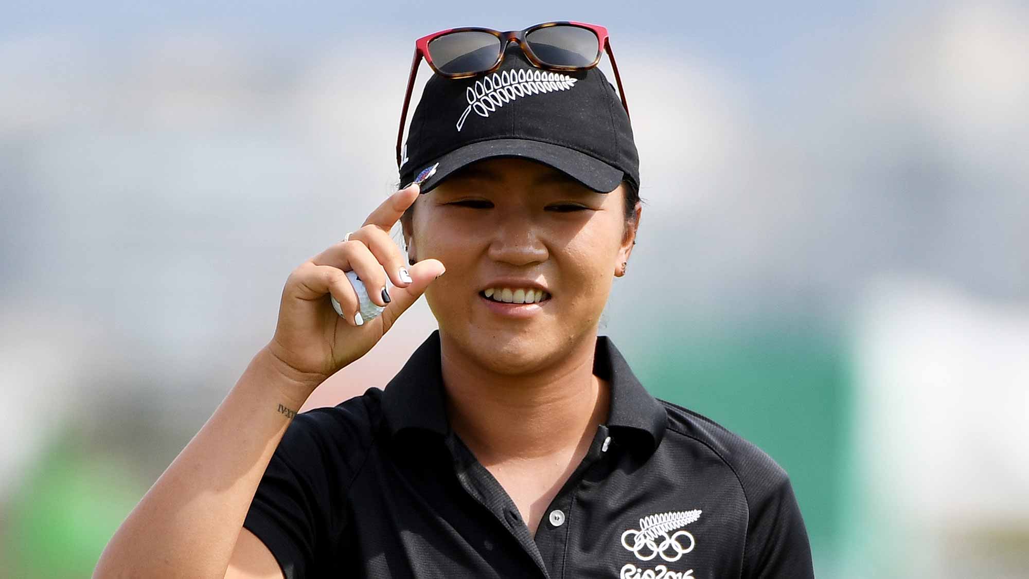 Lydia Ko of New Zealand reacts to her birdie on the seventh green during the Women's Golf Final on Day 15 of the Rio 2016 Olympic Games at the Olympic Golf Course
