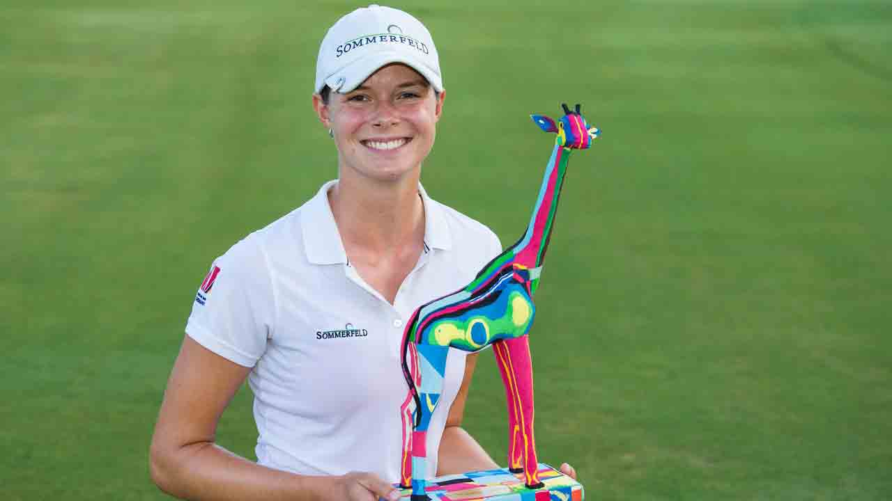 esther_henseleit_with_trophy_16x9.jpg