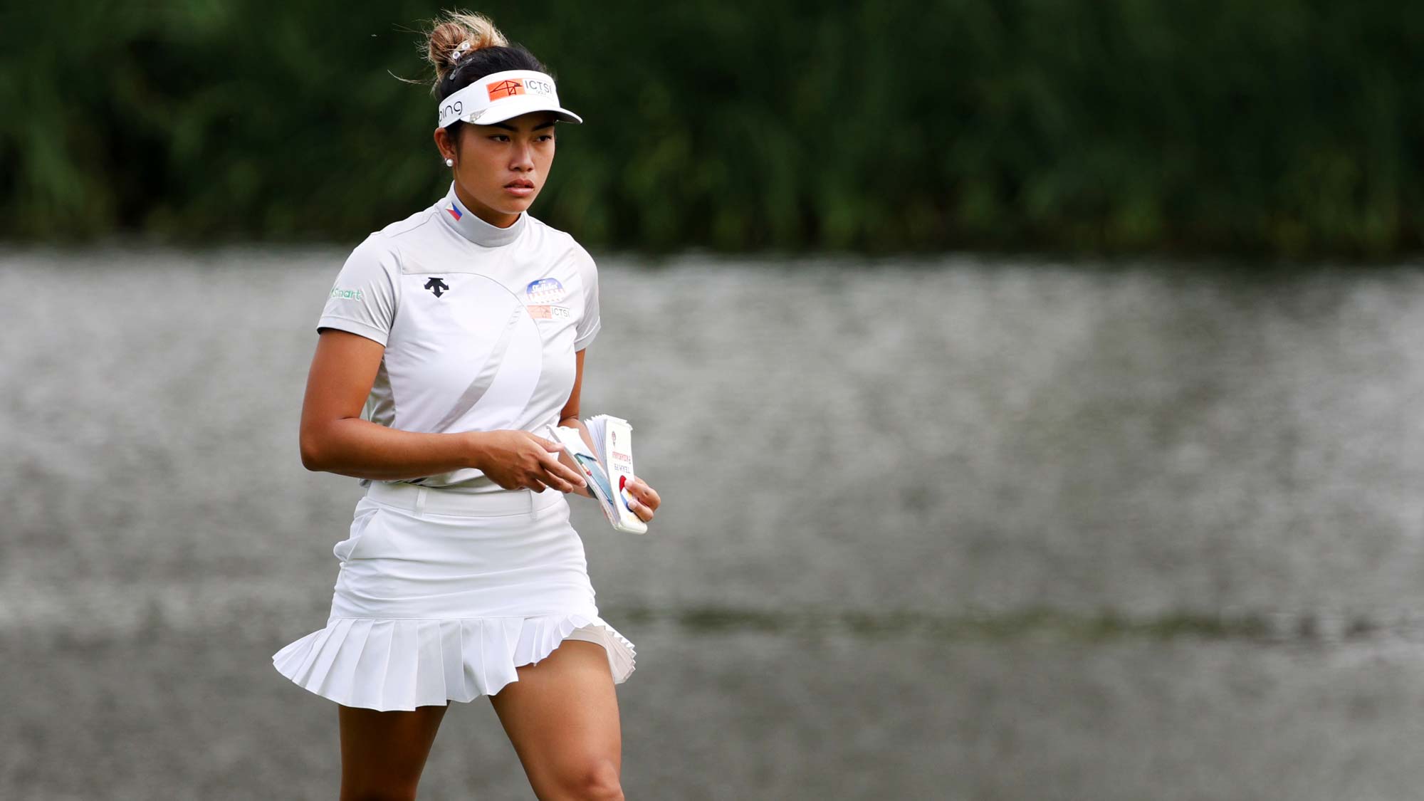 Bianca Pagdanganan of Philippines walks along the eighth hole during the first round of the KPMG Women's PGA Championship