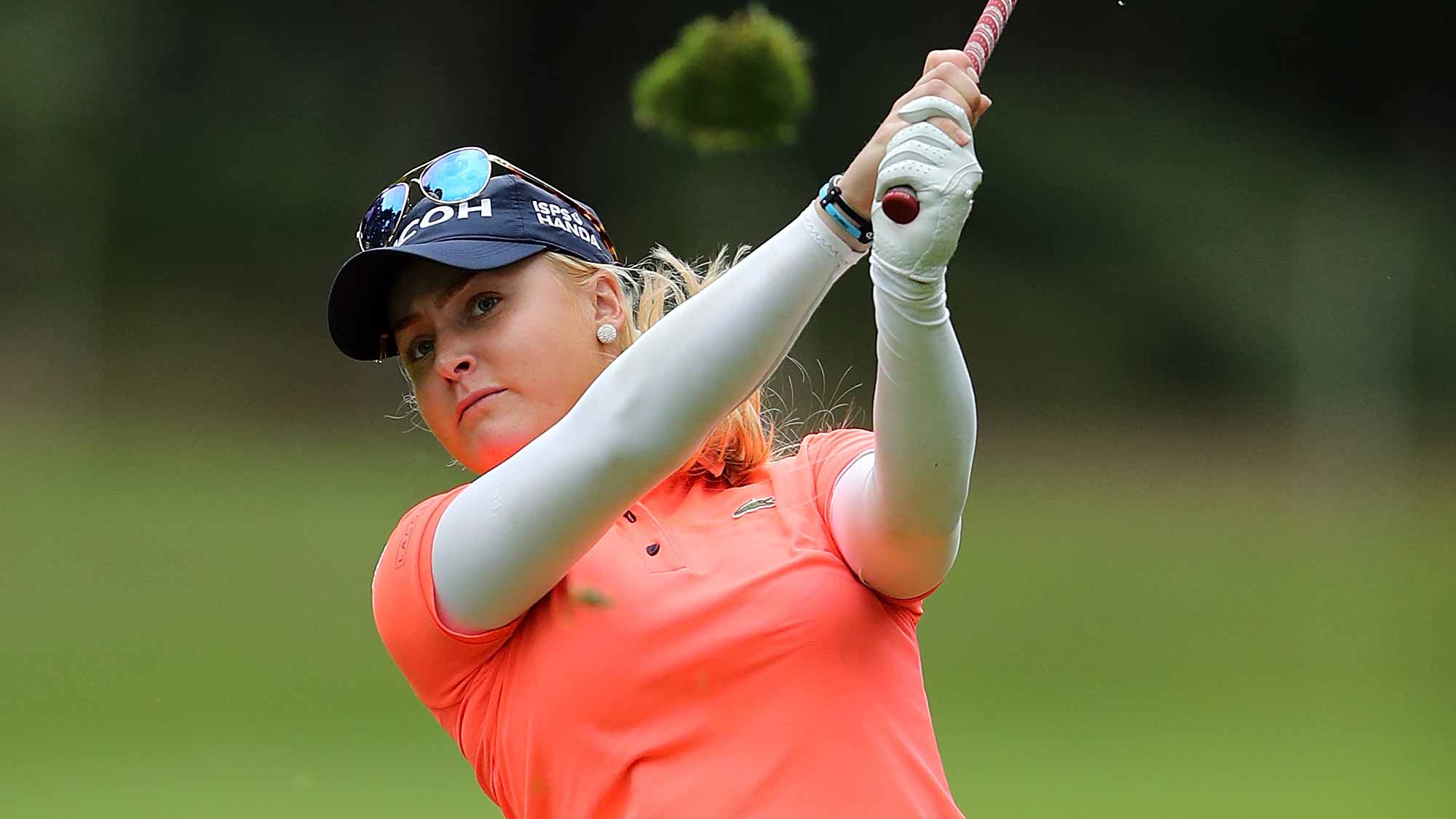 Charley Hull of England hits her second shot on the 18th hole during the final round of the Ricoh Women's British Open at Woburn Golf Club