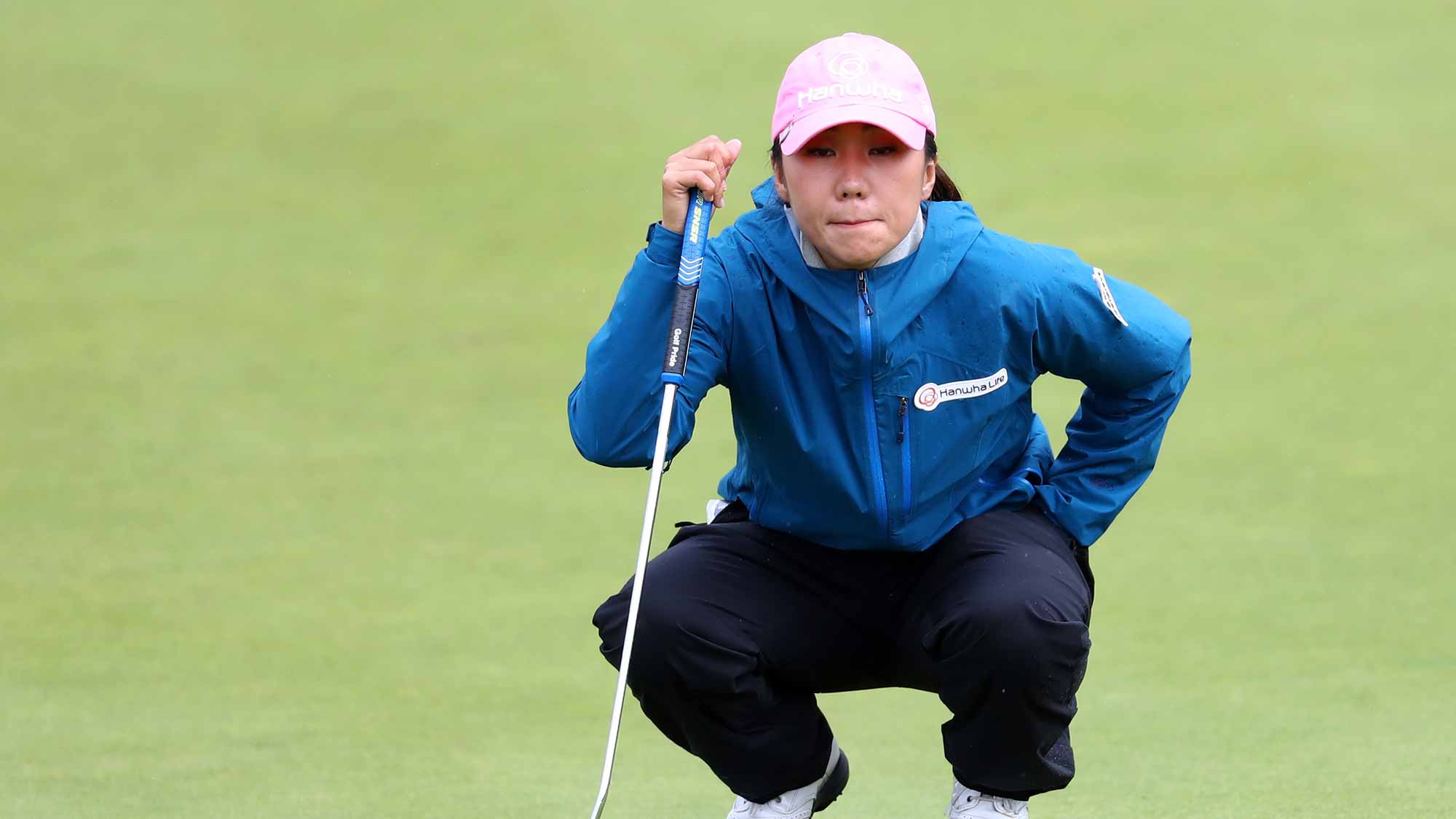 In-Kyung Kim of Korea lines up a putt on the 4th green during the third round of the Ricoh Women's British Open at Kingsbarns Golf Links 