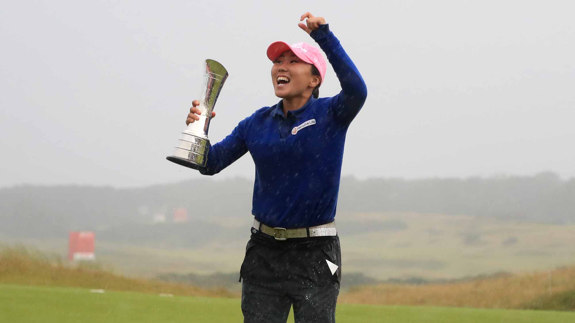 In-Kyung Kim of Korea celebrates with the trophy following her victory during the final round of the Ricoh Women's British Open at Kingsbarns Golf Links