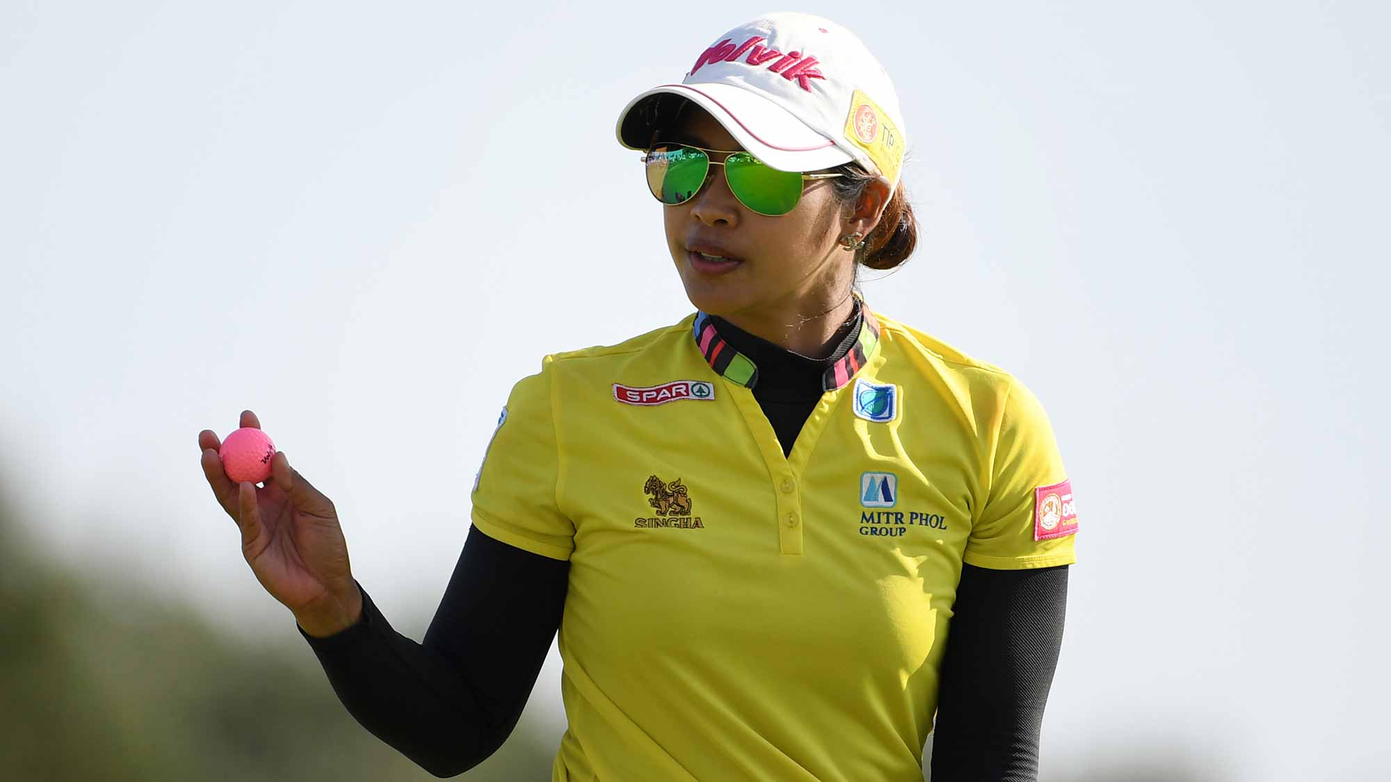 Pornanong Phatlum of Thailand waves with the ball on 12th green during day four of Ricoh Women's British Open at Royal Lytham & St. Annes on August 5, 2018 in Lytham St Annes, England