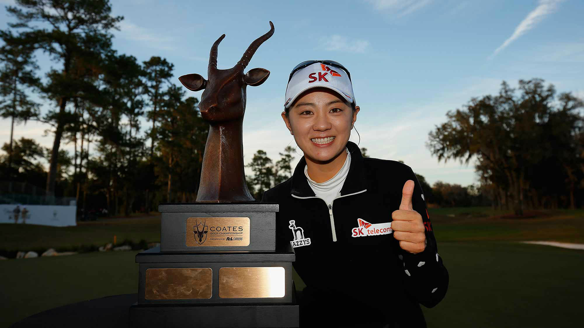 Na Yeon Choi of South Korea poses with the winners trophy following her victory at the Coates Golf Championship