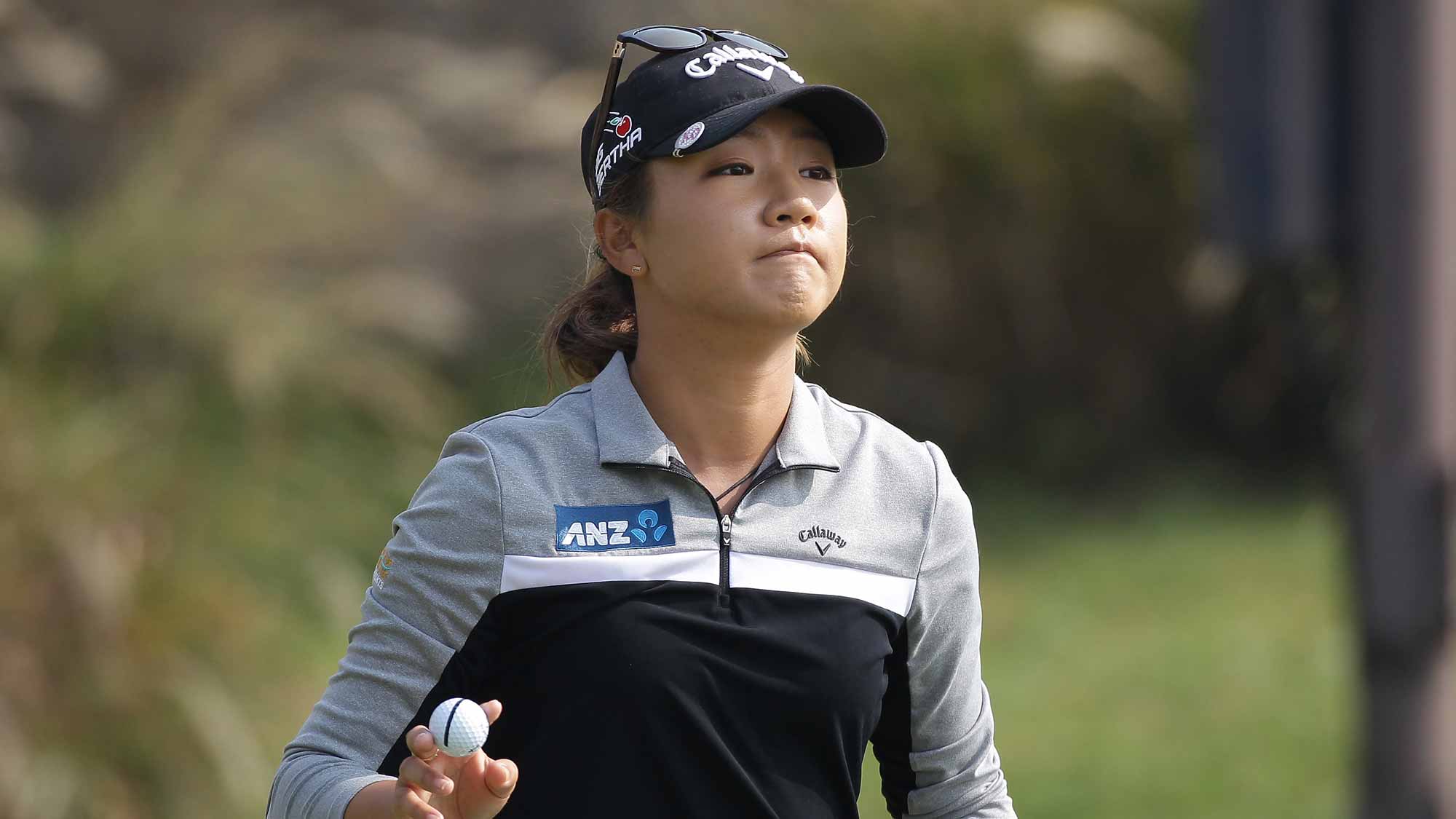 Lydia Ko of New Zealand reacts after a putt on the 2nd green during round four of the LPGA KEB Hana Bank