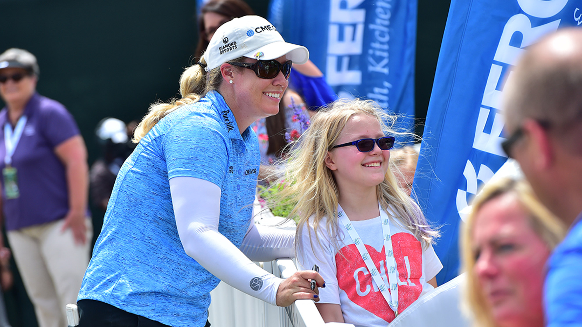 Brittany Lincicome and a Young Fan at Kingsmill Championship