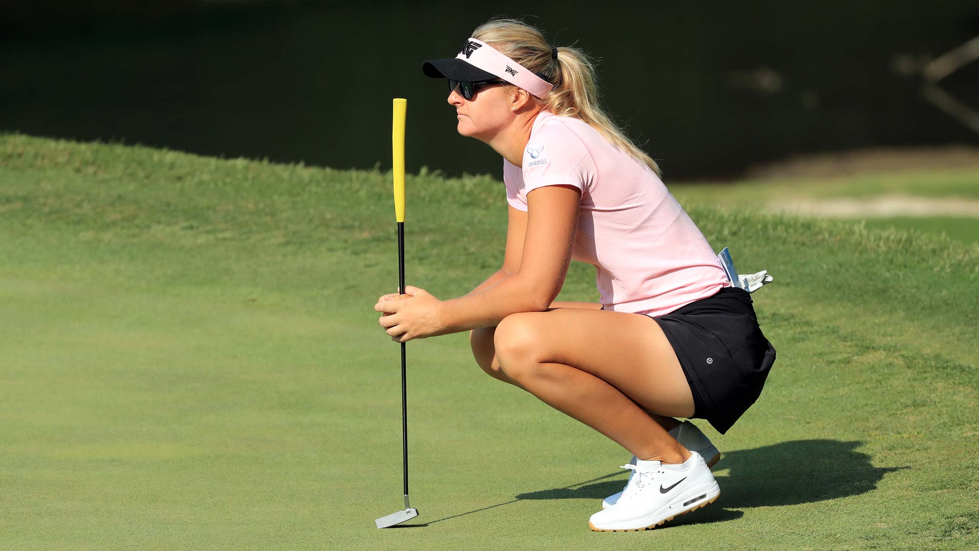 Anna Nordqvist of Sweden lines up her putt on the third hole during the first round of the Pure Silk Championship