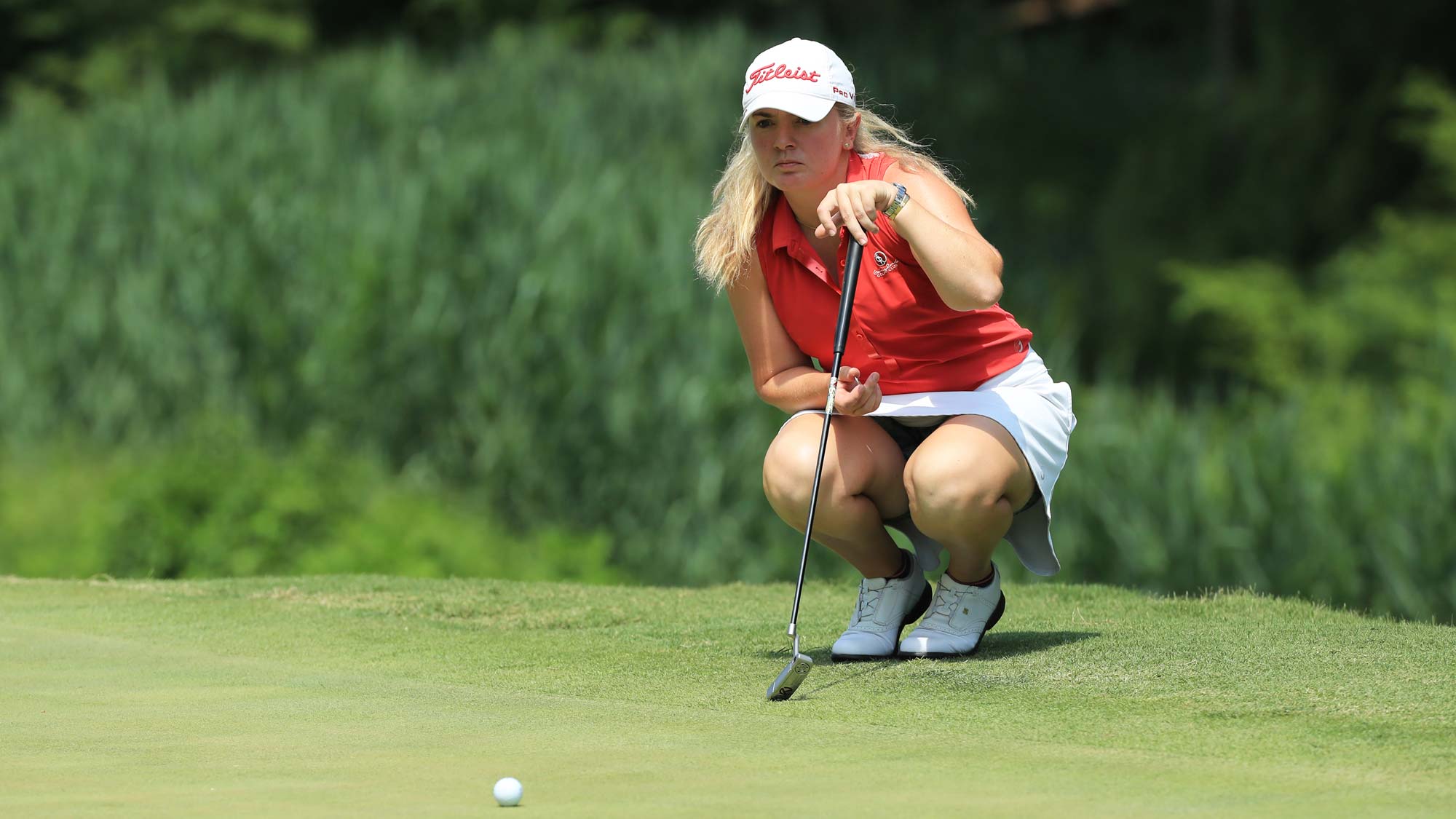 Bronte Law of England lines up her putt on the third hole during the first round of the Pure Silk Championship