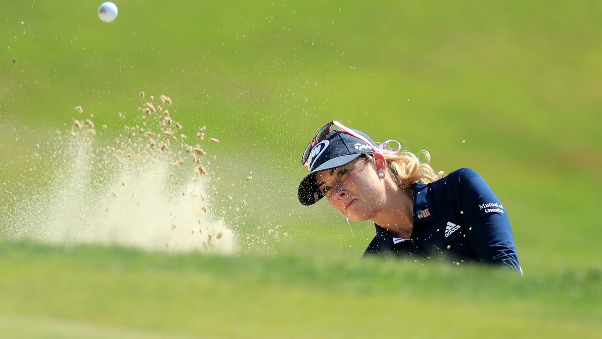 Paula Creamer hits out of a bunker on the 18th hole during the second round of the Pure Silk Championship 