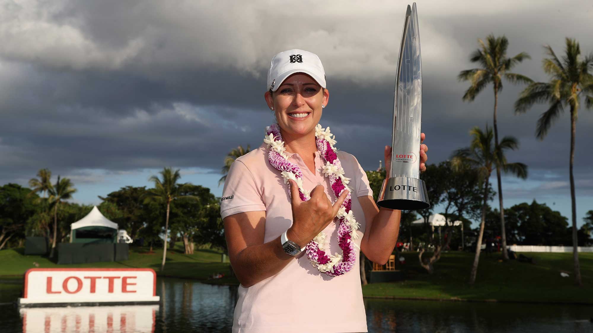 Cristie Kerr holds the LOTTE Championship Trophy presented by HERSHEY